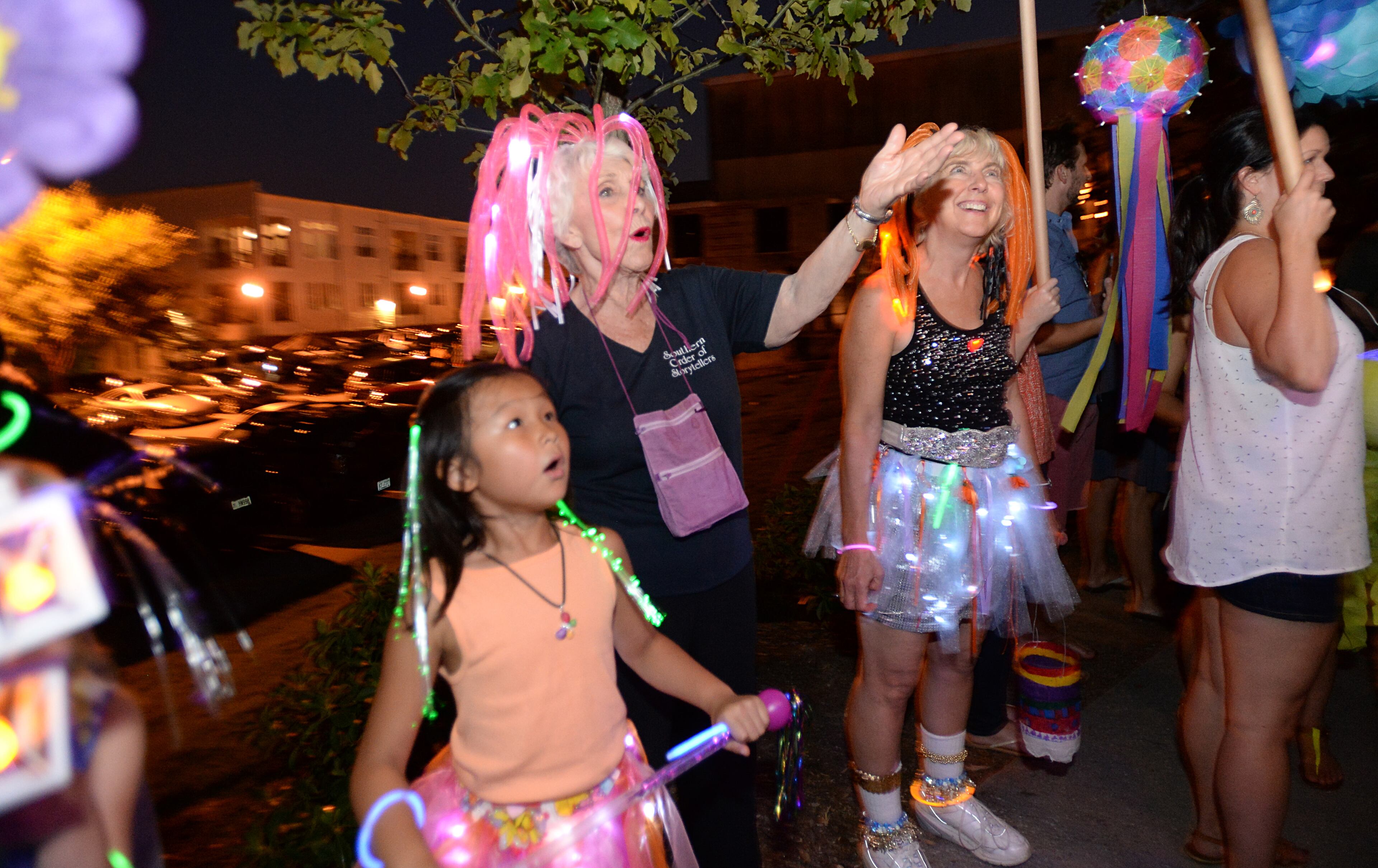 Avis Fox and her granddaughter Amalia Fox (left), 7, react during the 2013 Atlanta BeltLine Lantern Parade on Sept. 7, 2013.