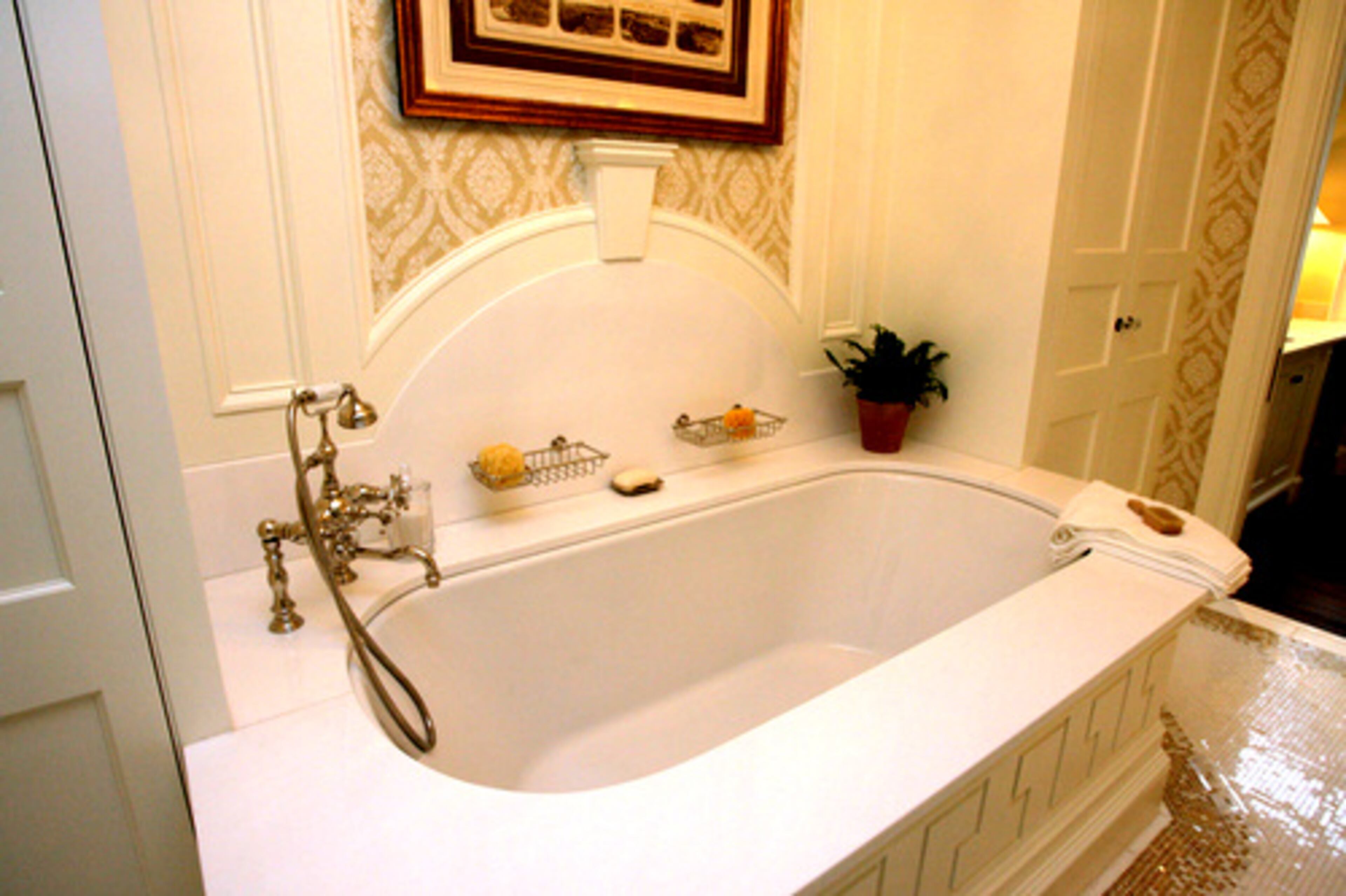 The soaking tub is in "her" bathroom.