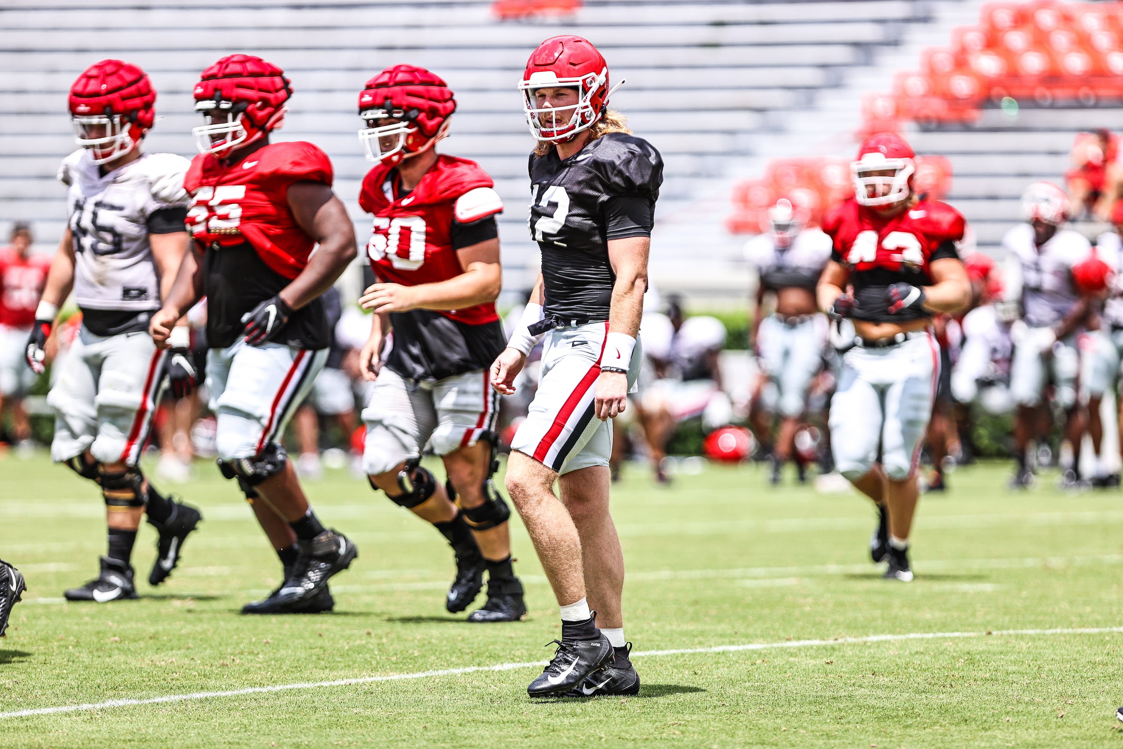 Georgia quarterback Brock Vandagriff (12) during the Bulldogs’ practice session on Dooley Field at Sanford Stadium in Athens, Ga., on Saturday, Aug. 14, 2021. (Photo by Tony Walsh)