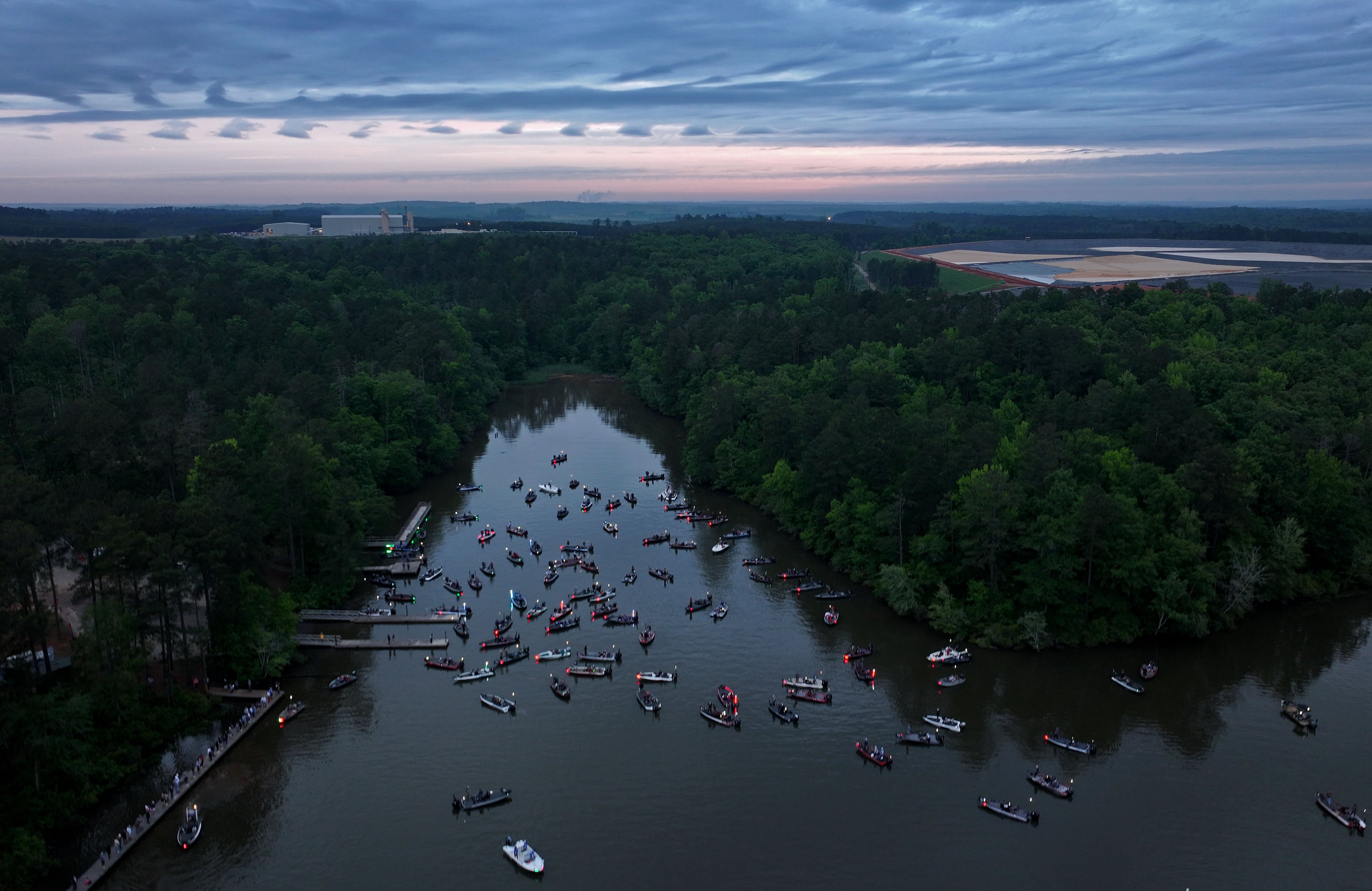 Contestants wait on Lake Sinclair for the start of the GHSA State Bass Fishing Championship on Saturday, May 9, 2026, in Eatonton. The relaxed nature of the sport creates a unique environment. (Hyosub Shin/AJC)