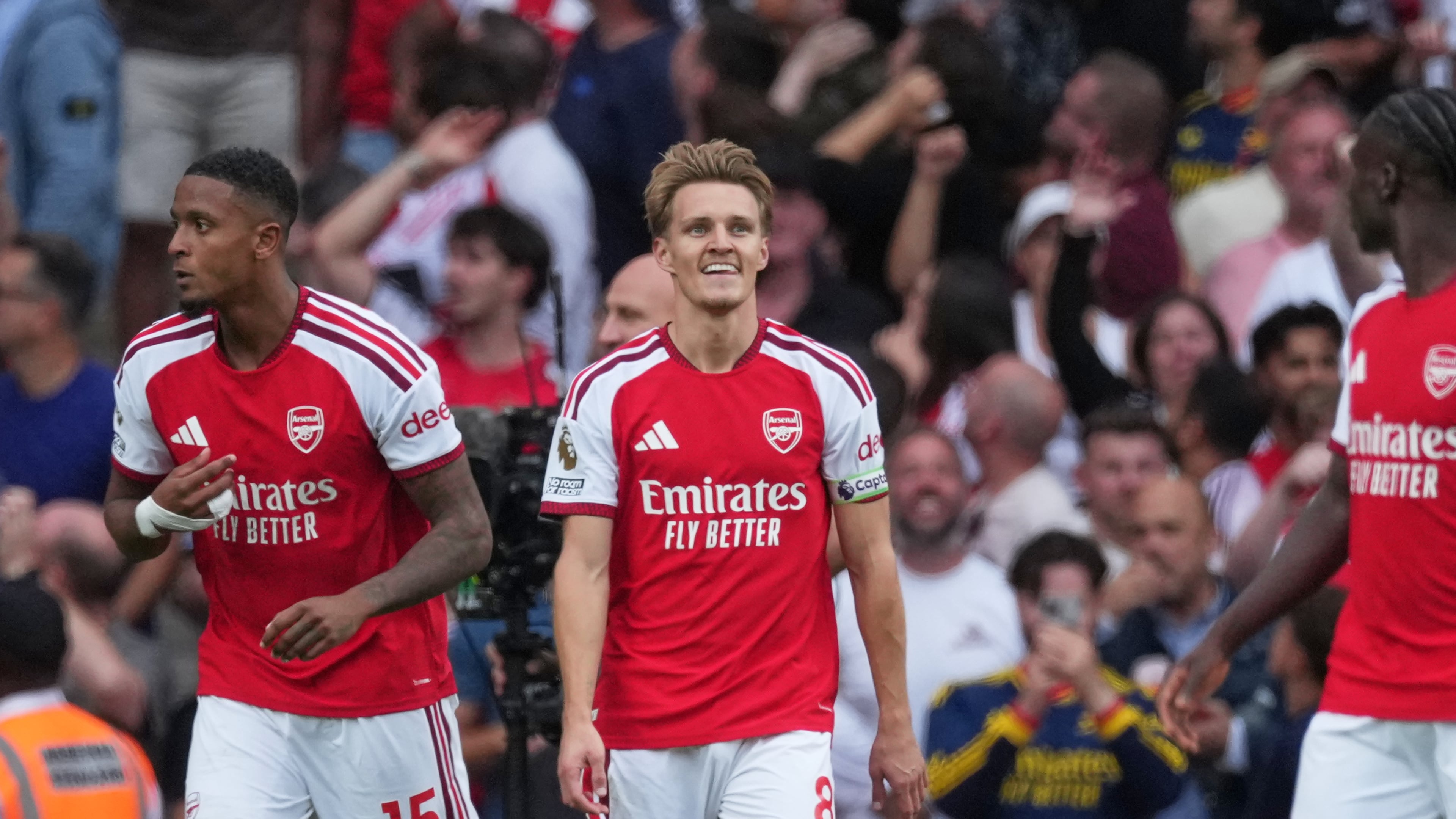 Arsenal's Martin Odegaard, centre, reacts during the English Premier League soccer match between Arsenal and Chelsea in London, Sunday, Sept. 6, 2026. (AP Photo/Dave Shopland)
