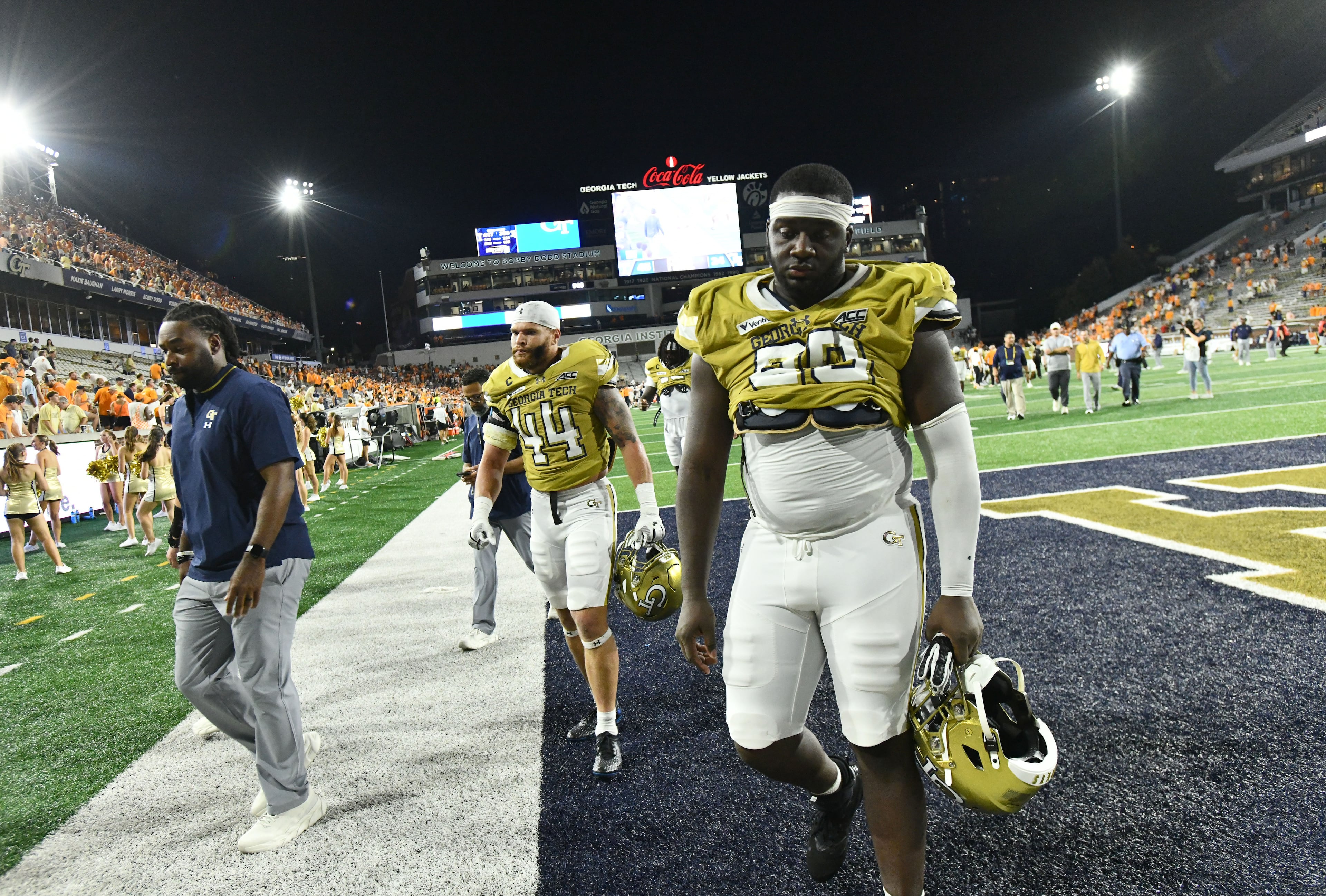 Georgia Tech players leave the field after a 45-24 loss to Tennessee in an NCAA college football game at Bobby Dodd Stadium on Saturday, Sept. 12, 2026, in Atlanta. (Hyosub Shin/AJC)