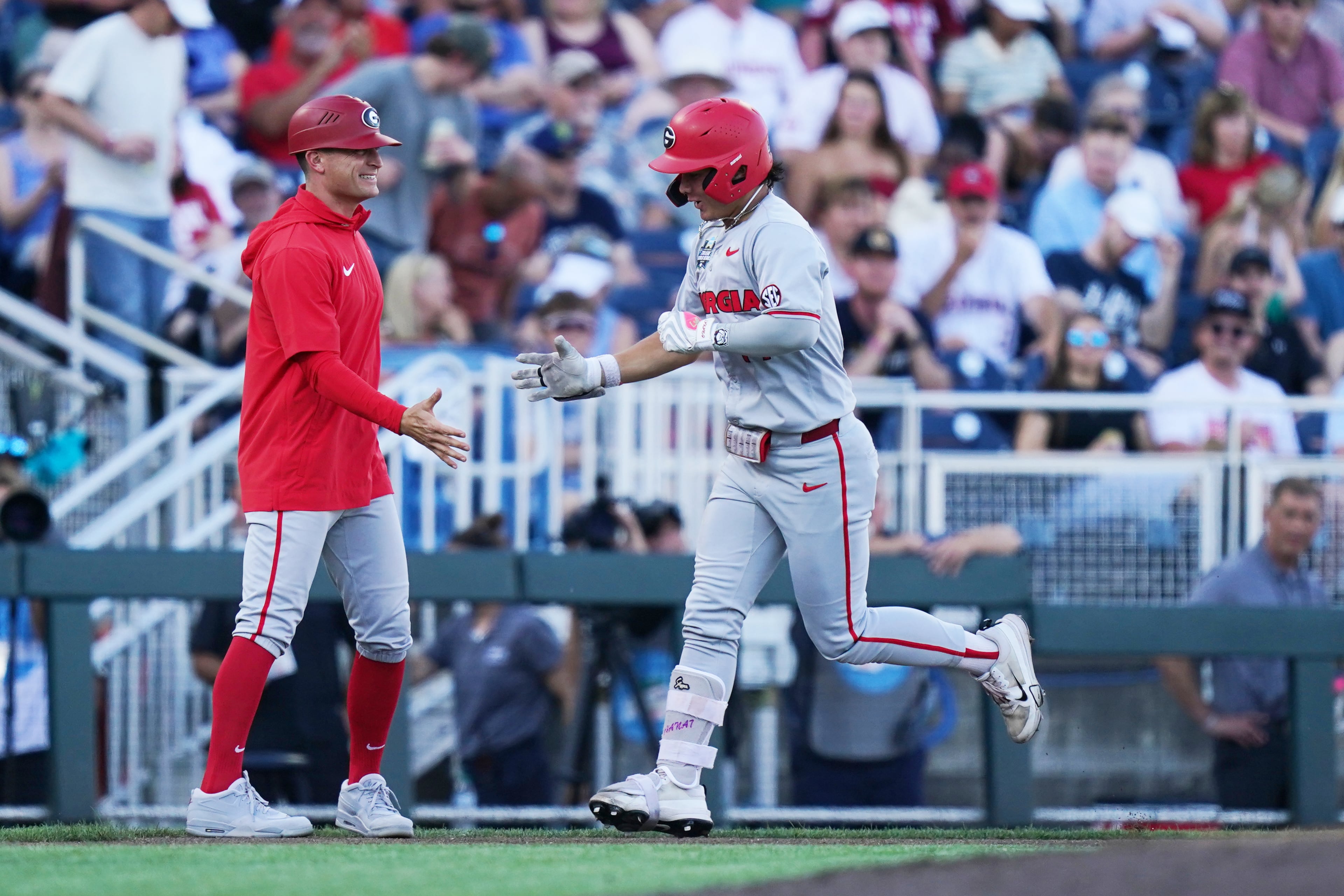 Georgia utility player Kenny Ishikawa rounds the bases after hitting a homer during a College World Series game against Oklahoma on Monday, June 15, 2026, in Omaha, Neb. (Vera Nieuwenhuis/AP)