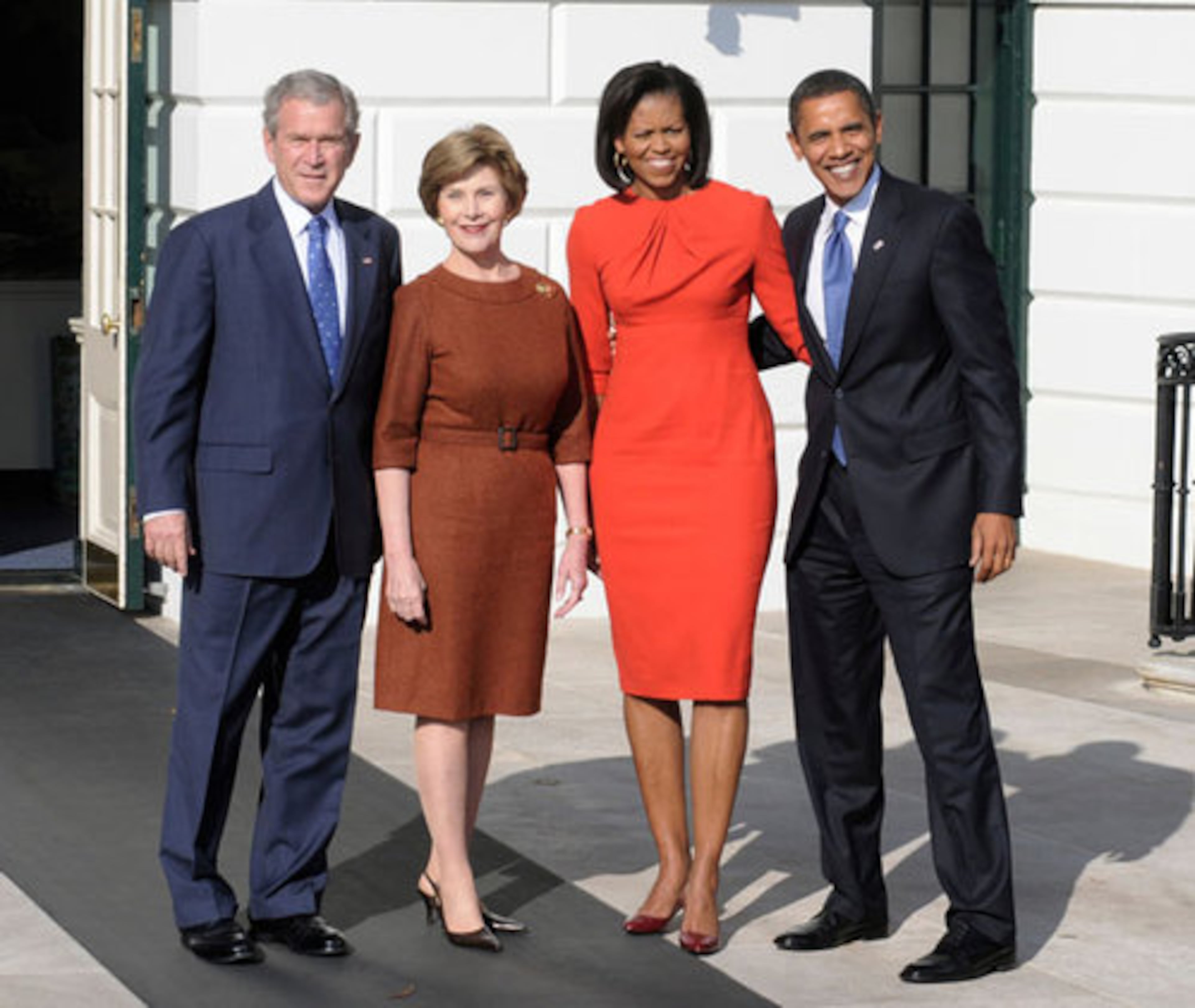 President George W. Bush and First Lady Laura Bush welcome President-elect Barack Obama and his wife Michelle Obama to the White House .
