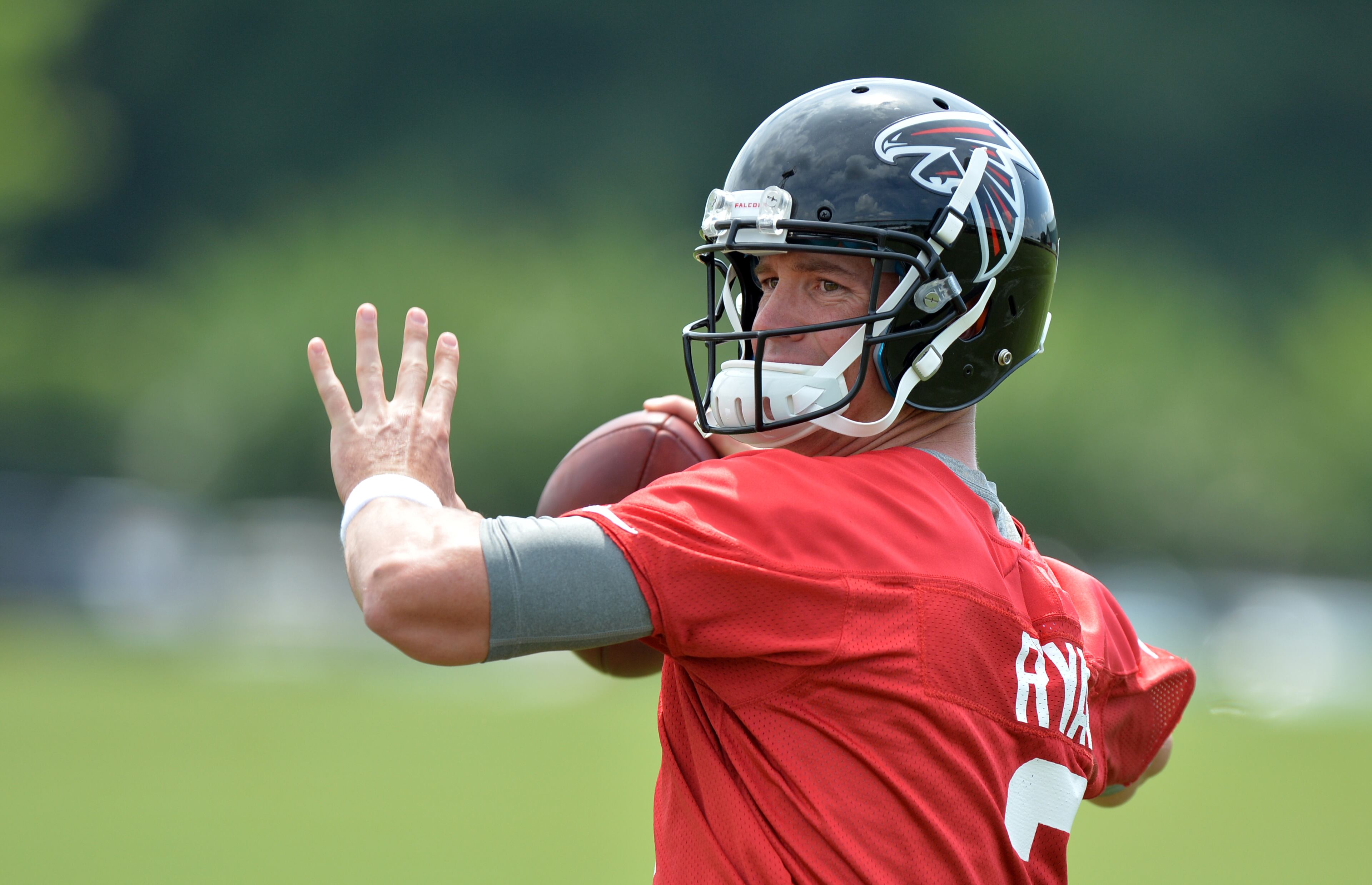 Atlanta Falcons quarterback Matt Ryan tosses during training camp on Friday, July 25, 2014.