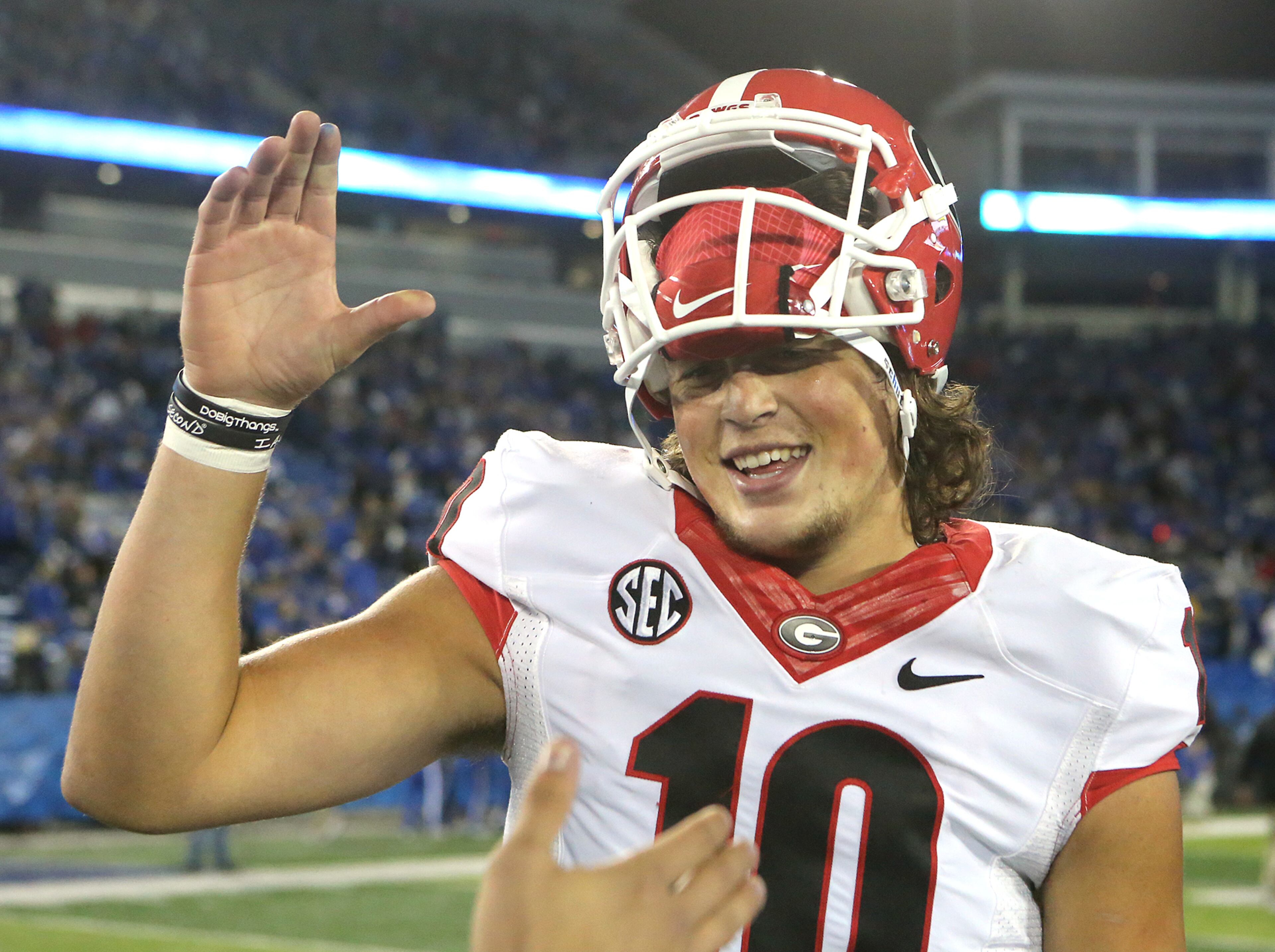 November 5, 2016, LEXINGTON: Georgia quarterback Jacob Eason celebrates a 27-24 victory over Kentucky in an NCAA college football game on Saturday, Nov. 5, 2016, in Lexington. Curtis Compton /ccompton@ajc.com