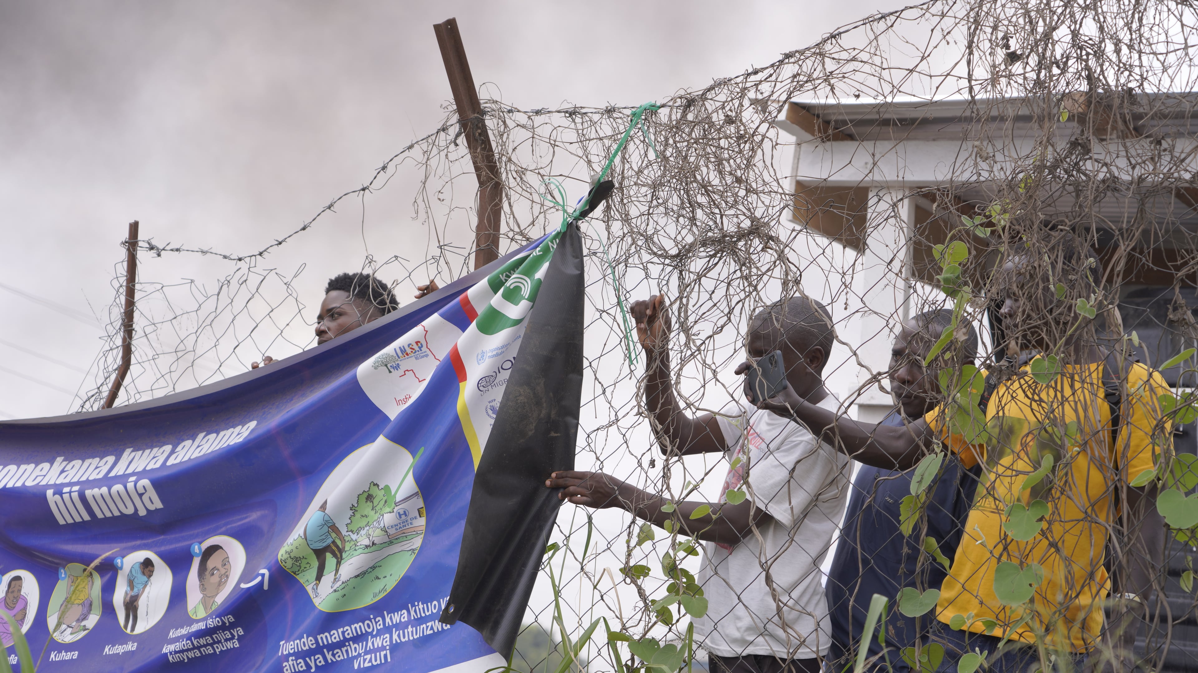 Workers at an Ebola treatment center go on strike over unpaid salaries and bonuses at Rwampara General Hospital, in Ituri, northeastern Congo, Monday, July 13, 2026, (AP Photo/Dirole Lotsima Dieudonne)