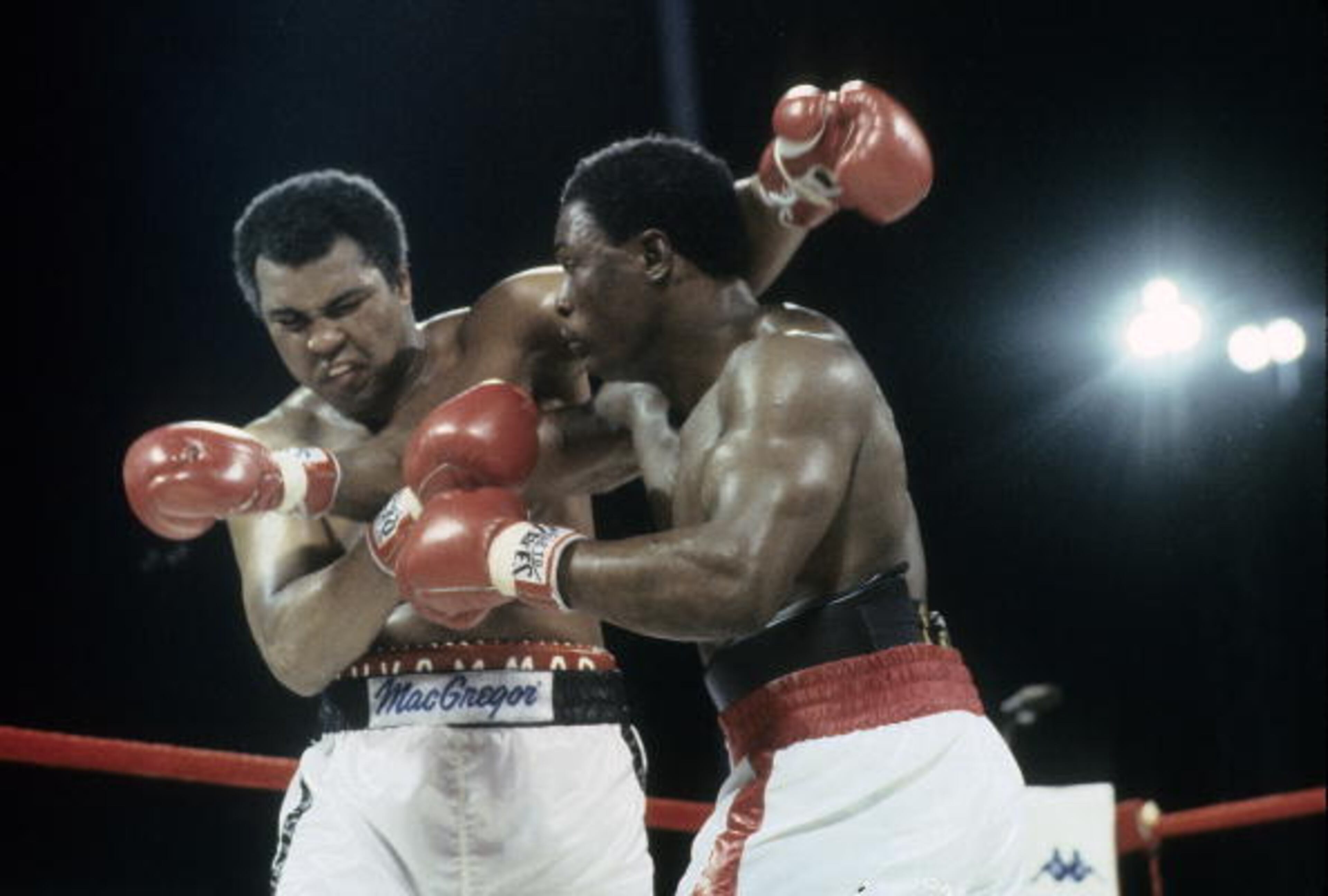 BAHAMAS - DECEMBER 11, 1981: Heavyweight Boxing: Closeup of Trevor Berbick (R) in action, throwing punch vs Muhammad Ali (L) December 11, 1981, at Queen Elizabeth Sports Centre, Nassau, Bahamas, Ali's final fight. (Photo by Focus on Sport/Getty Images)