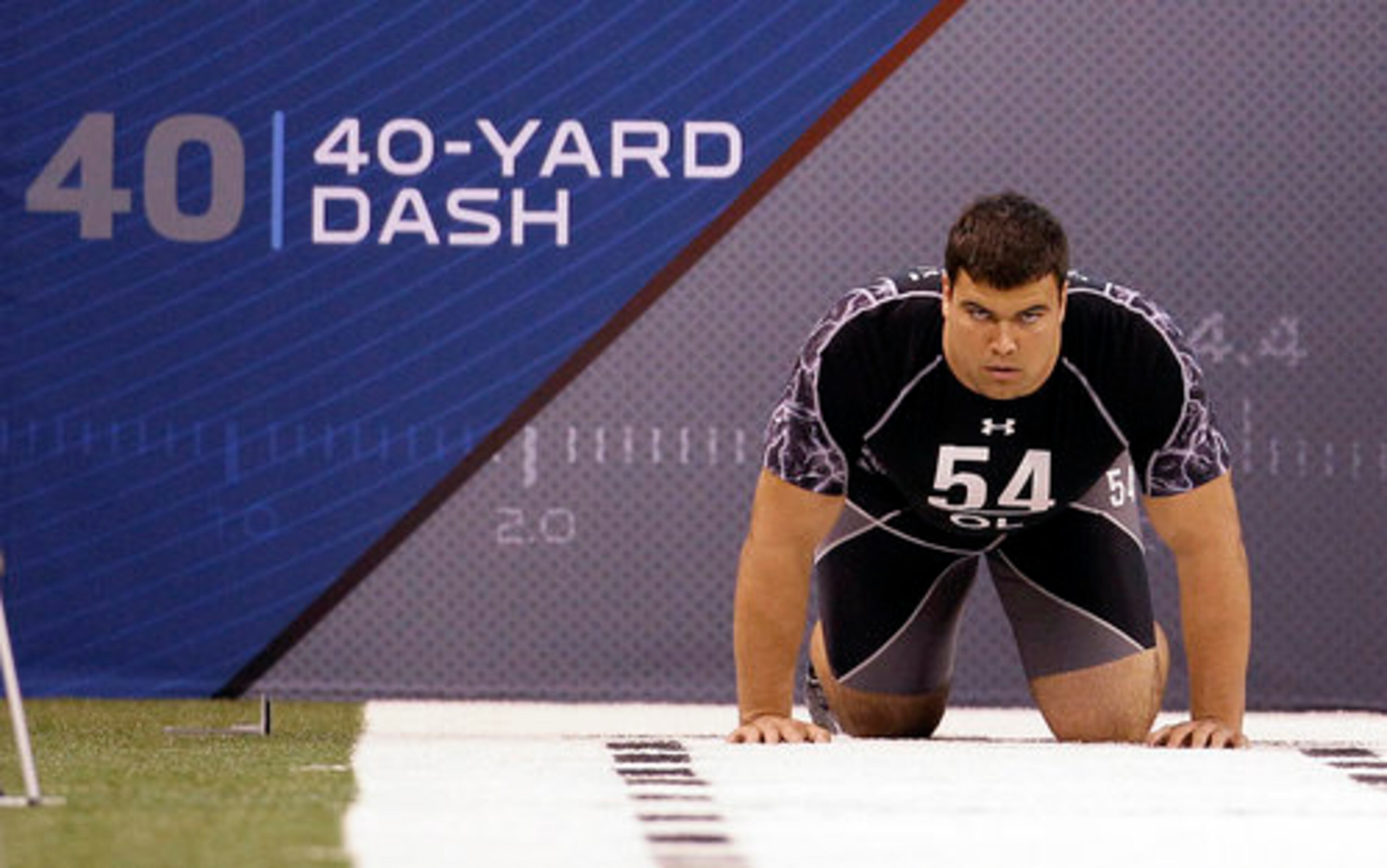 Penn State offensive lineman Stefen Wisniewski sets up for his 40-yard dash. The 6-foot-3, 313 pound lineman ran a 5.32. Only two of the 54 offensive linemen participants ran a sub-5.0 40-yard dash.