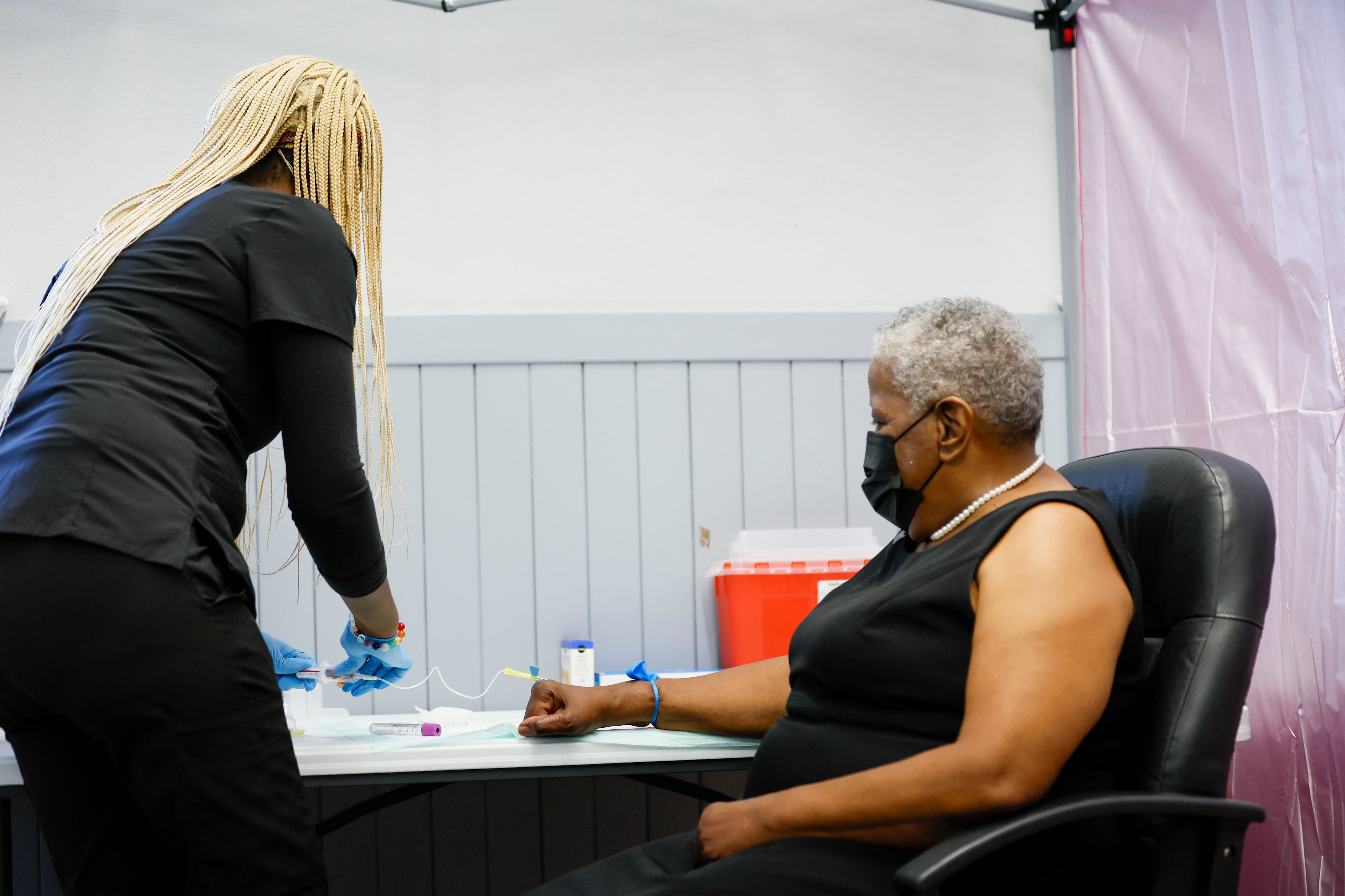 Phlebotomist Chantae Knowles conducted a blood screening for Rome resident Sara D. Malone as part of a study led by researchers from Emory University’s Rollins School of Public Health. The study aims to investigate the presence of "forever chemicals."
(Miguel Martinez/ AJC)