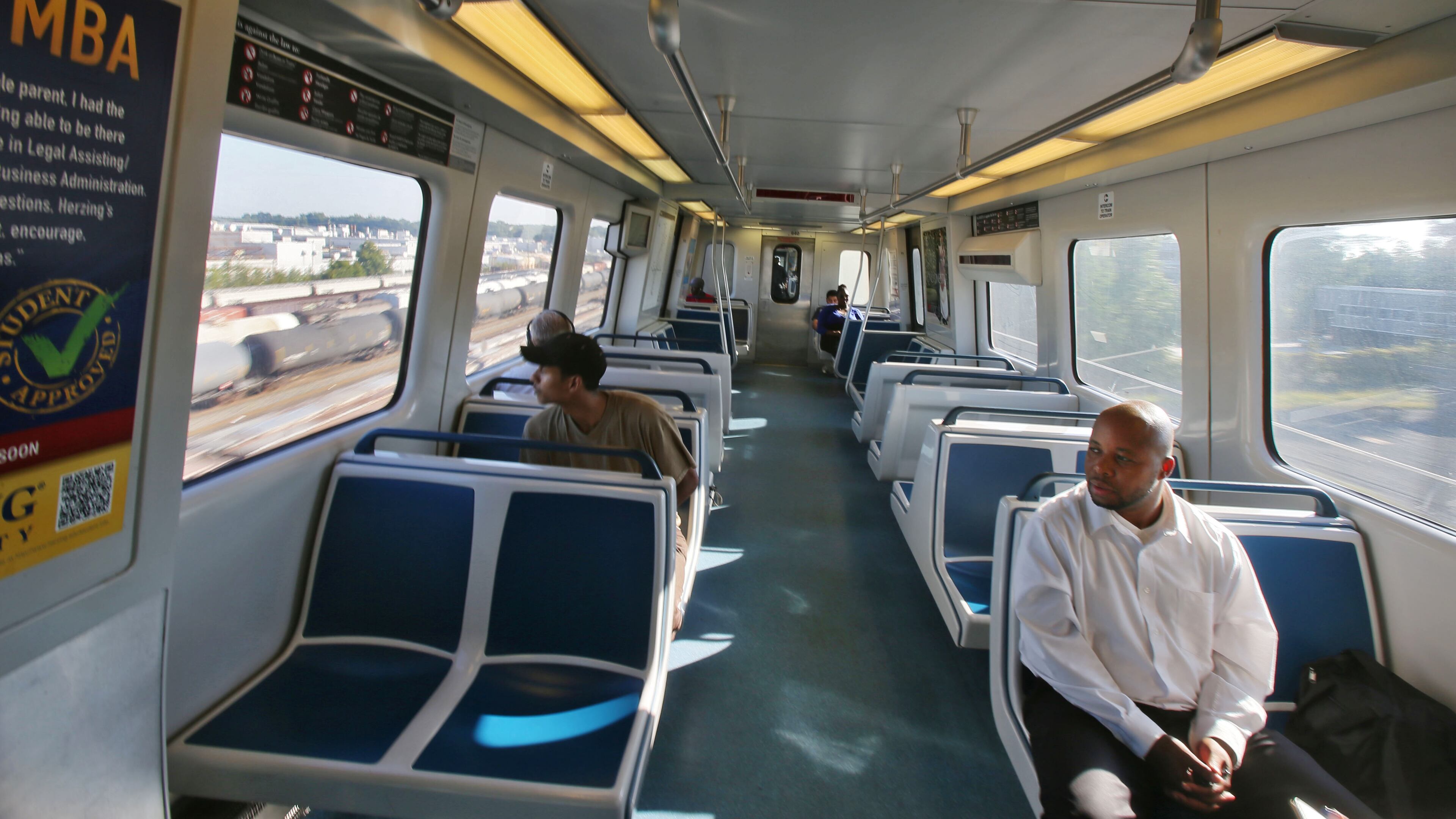 Sep. 23, 2013 - Ric Jilla, (right) rides MARTA from the Doraville station into Atlanta. BOB ANDRES / BANDRES@AJC.COM