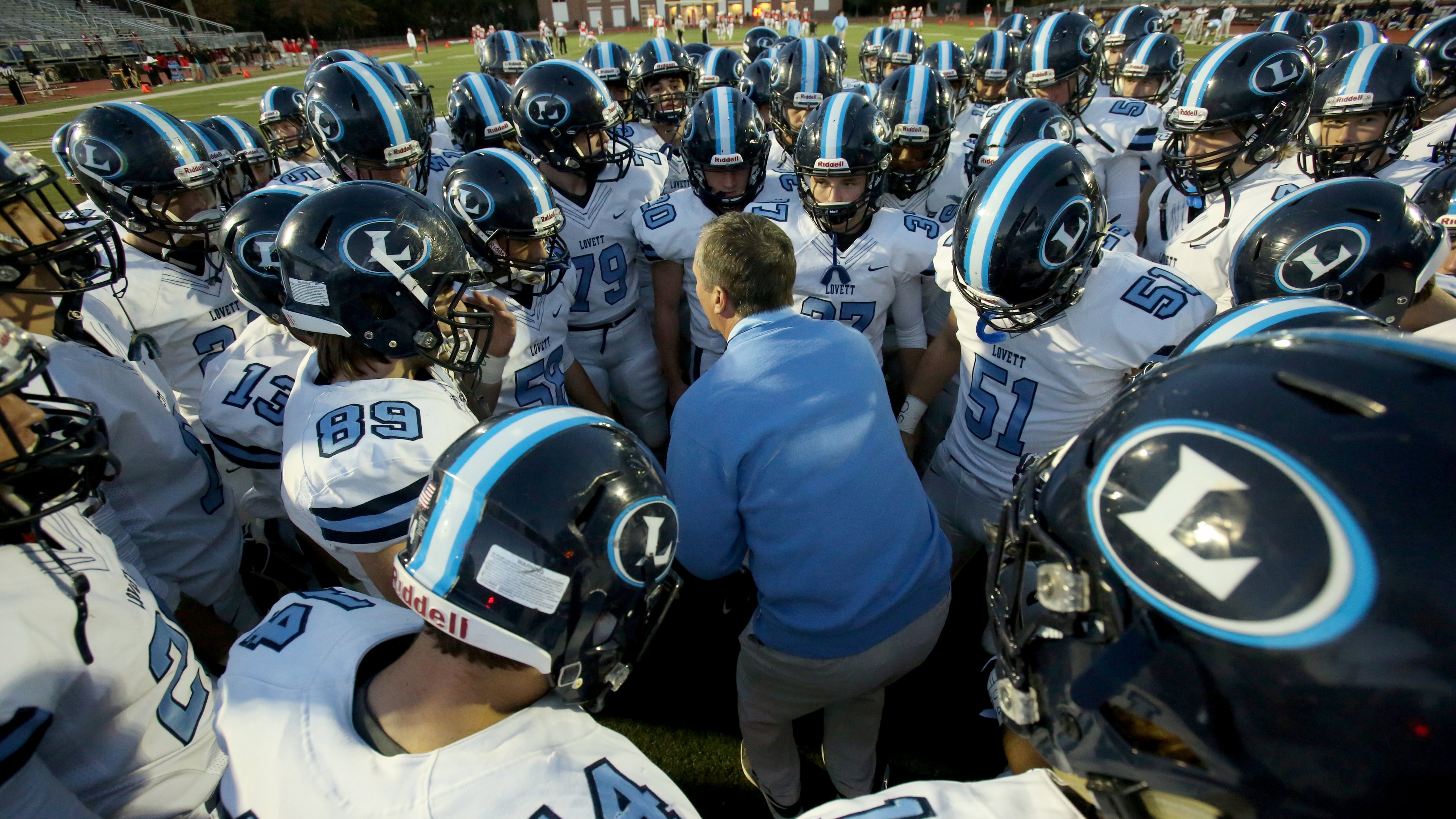 Lovett head coach Mike Muschamp rallies his team. (Jason Getz/For the AJC)