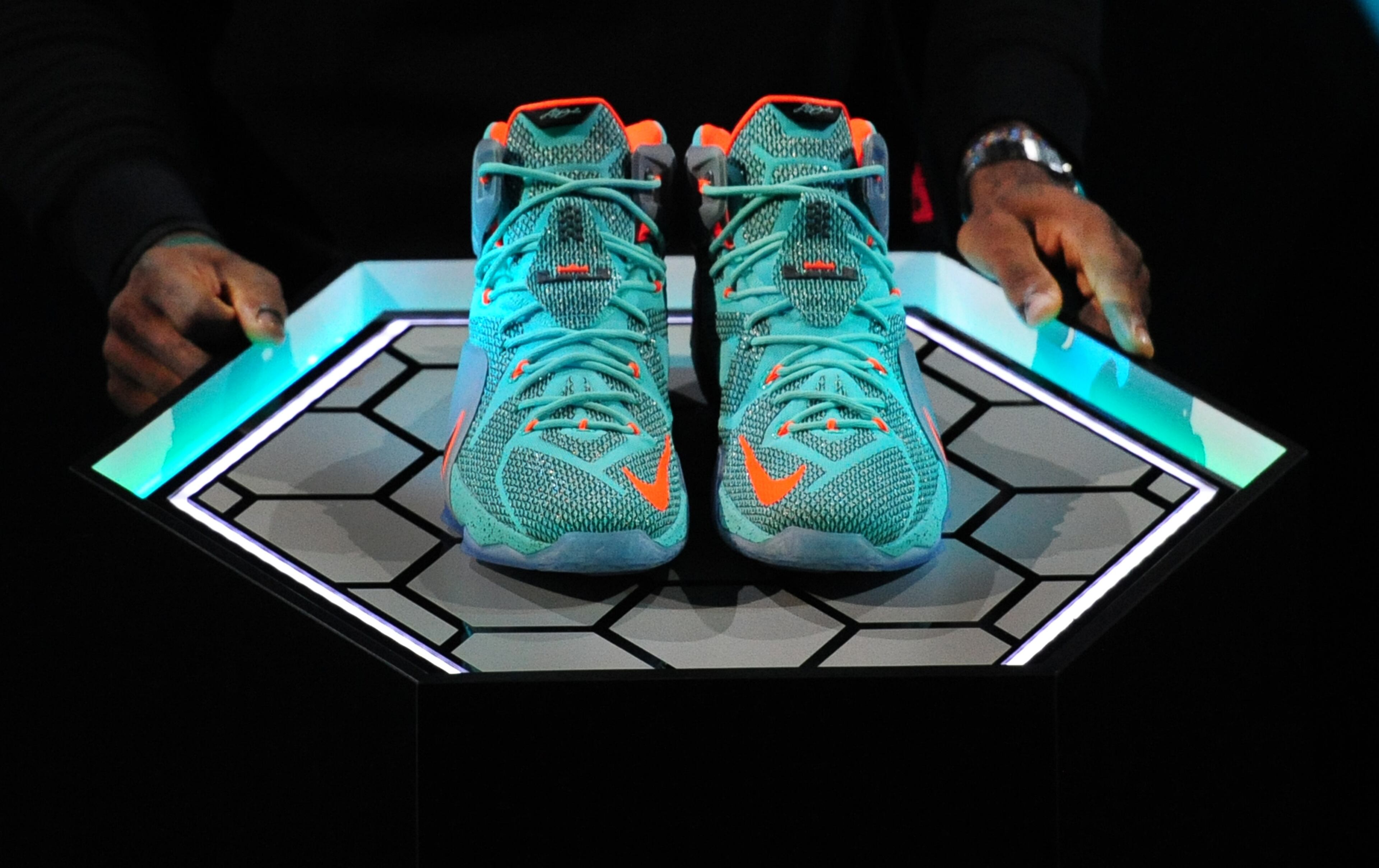 The shoe, his 12th since signing with Nike as a rookie out of high school in 2003, features multicolored hexagonal cushions on the soles. It retails for $200, and versions of it will start hitting stores next month. -- Associated Press