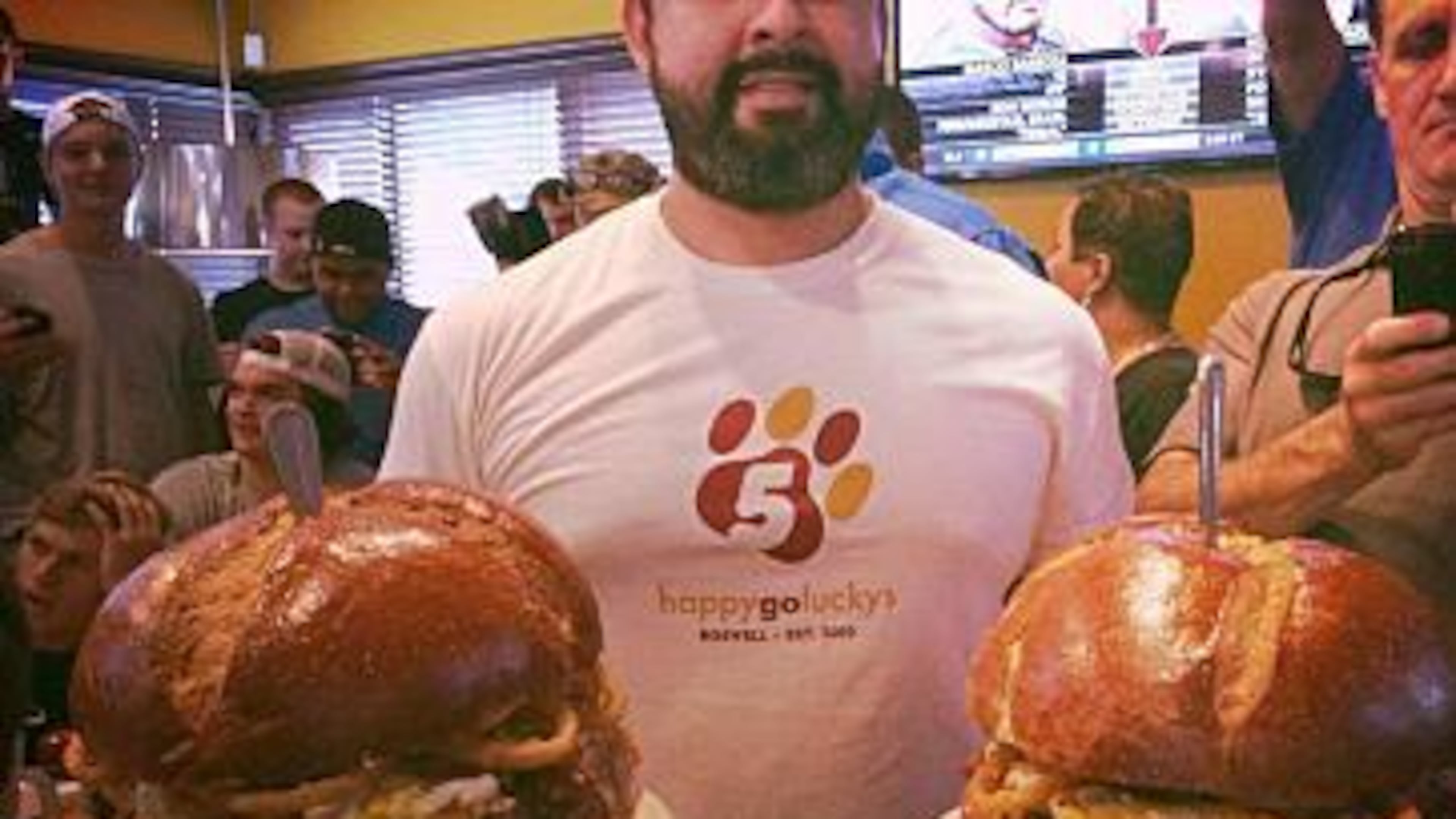 The Grim Reaper Burger includes a 4-pound patty, eight slices of cheese, 12 strips of bacon, seven fried eggs and more.