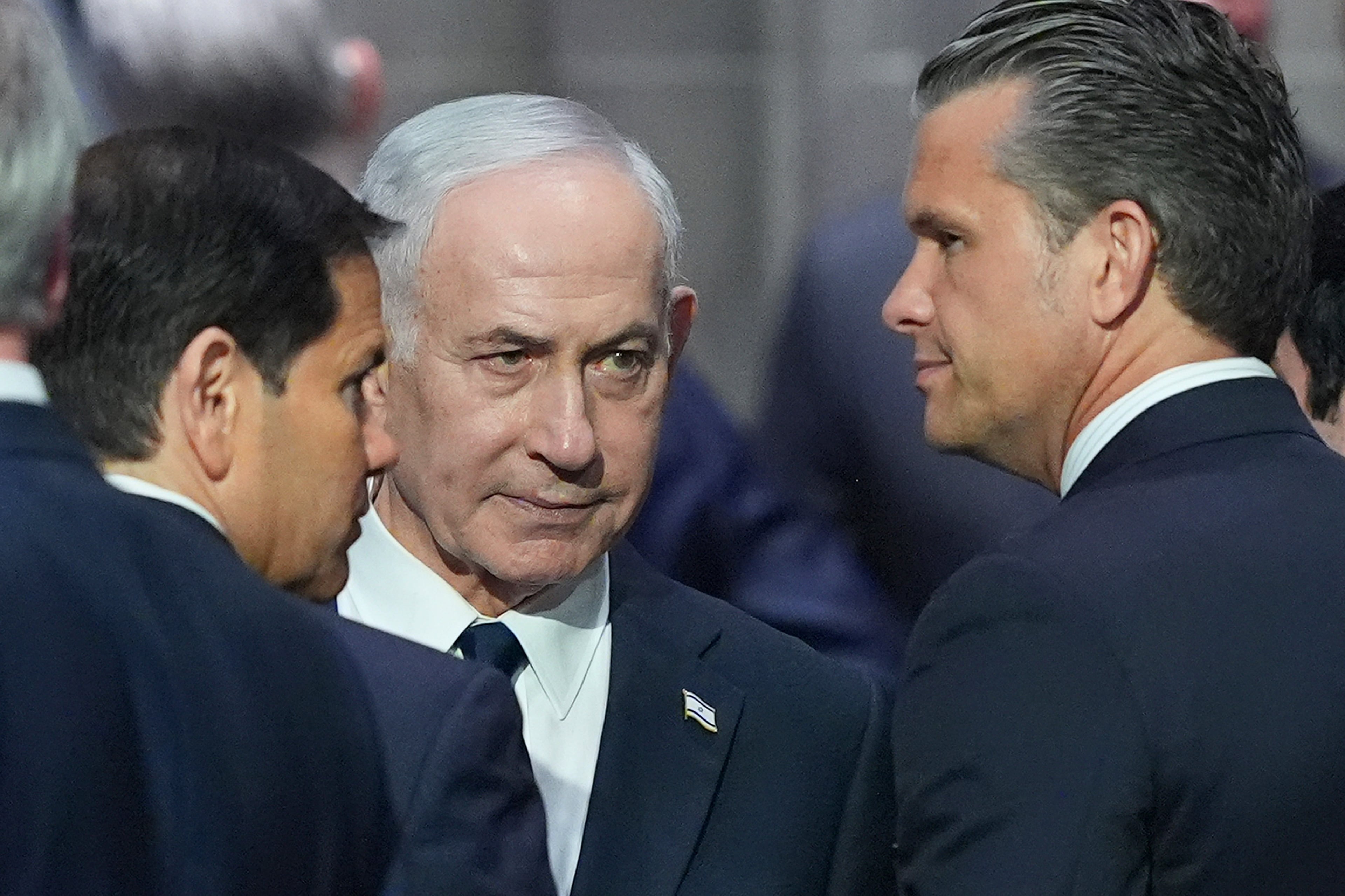 Israeli Prime Minister Benjamin Netanyahu, center, speaks to Secretary of Defense Pete Hegseth, right, and Secretary of State Marco Rubio, left, before the funeral of Sen. Lindsey Graham, R-S.C., Tuesday July 28, 2026, at the Washington National Cathedral in Washington. (Jacquelyn Martin/AP)