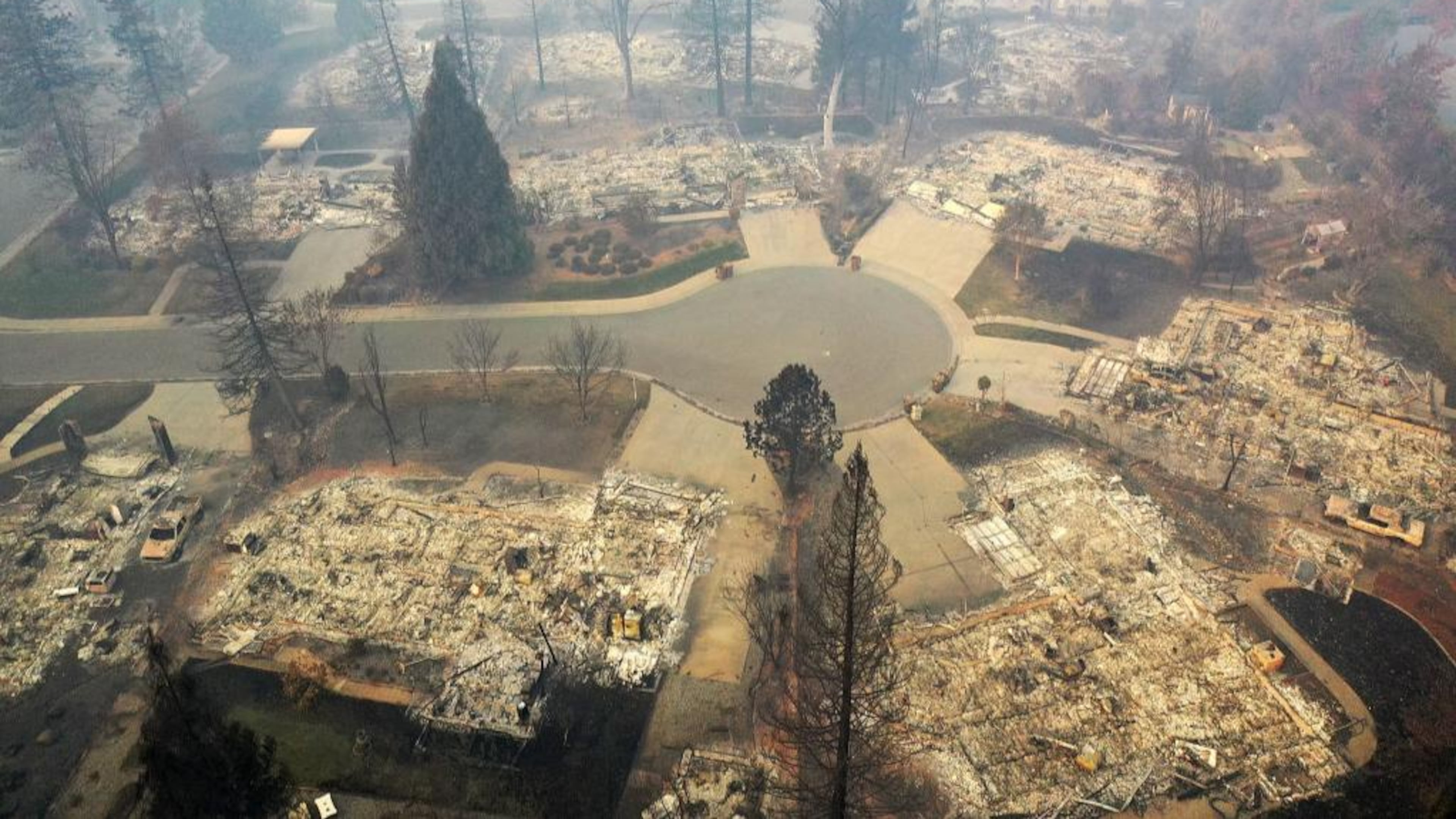 An aerial view of a neighborhood destroyed by the Camp Fire on November 15, 2018 in Paradise, California. Fueled by high winds and low humidity the Camp Fire ripped through the town of Paradise charring over 140,000 acres, killing at least 56 people and destroying over 8,500 homes and businesses. The fire is currently at 40 percent containment.