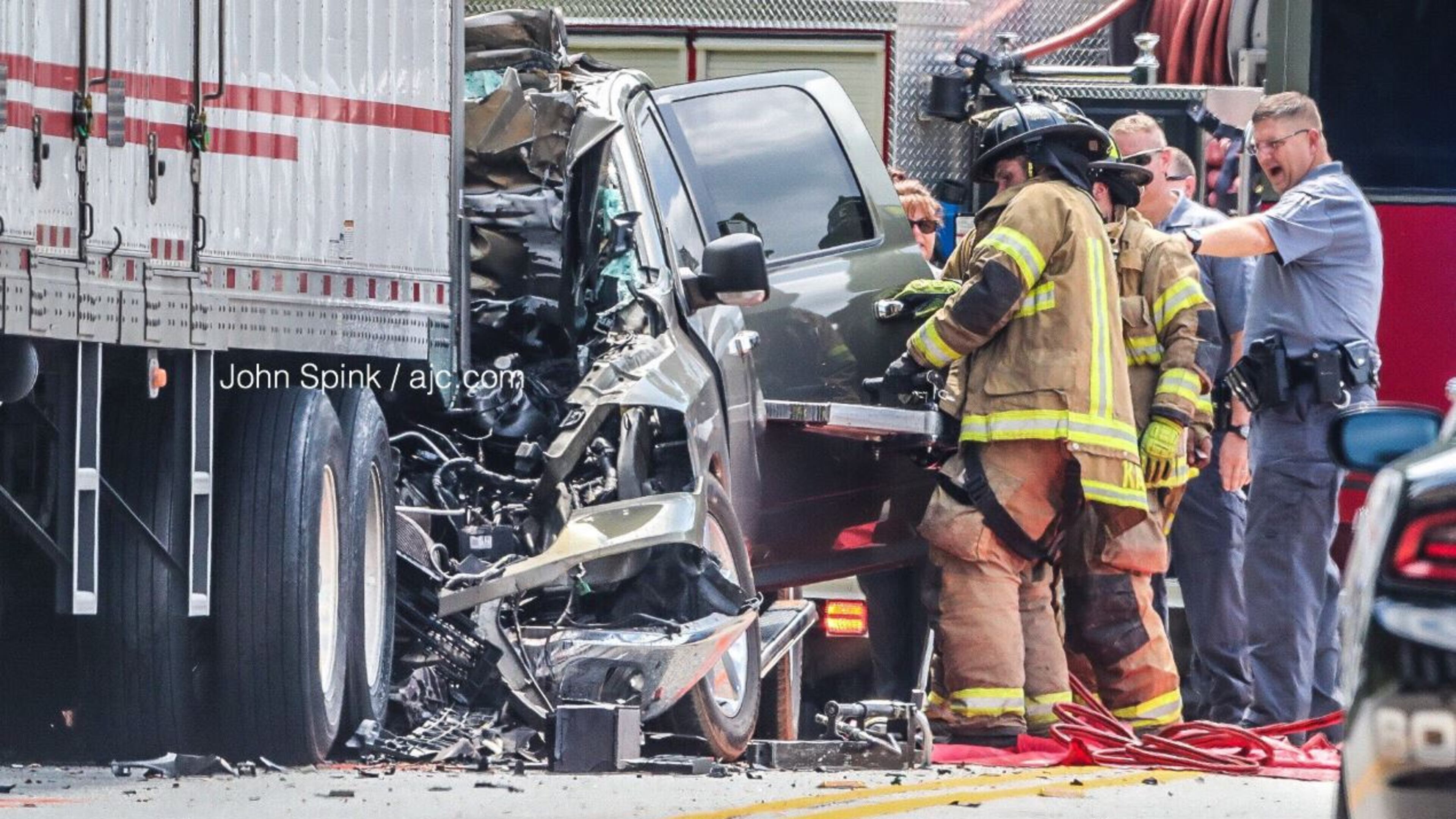 An SUV crashed into a tractor-trailer Tuesday on Campbellton Road at Fulton Industrial Boulevard.