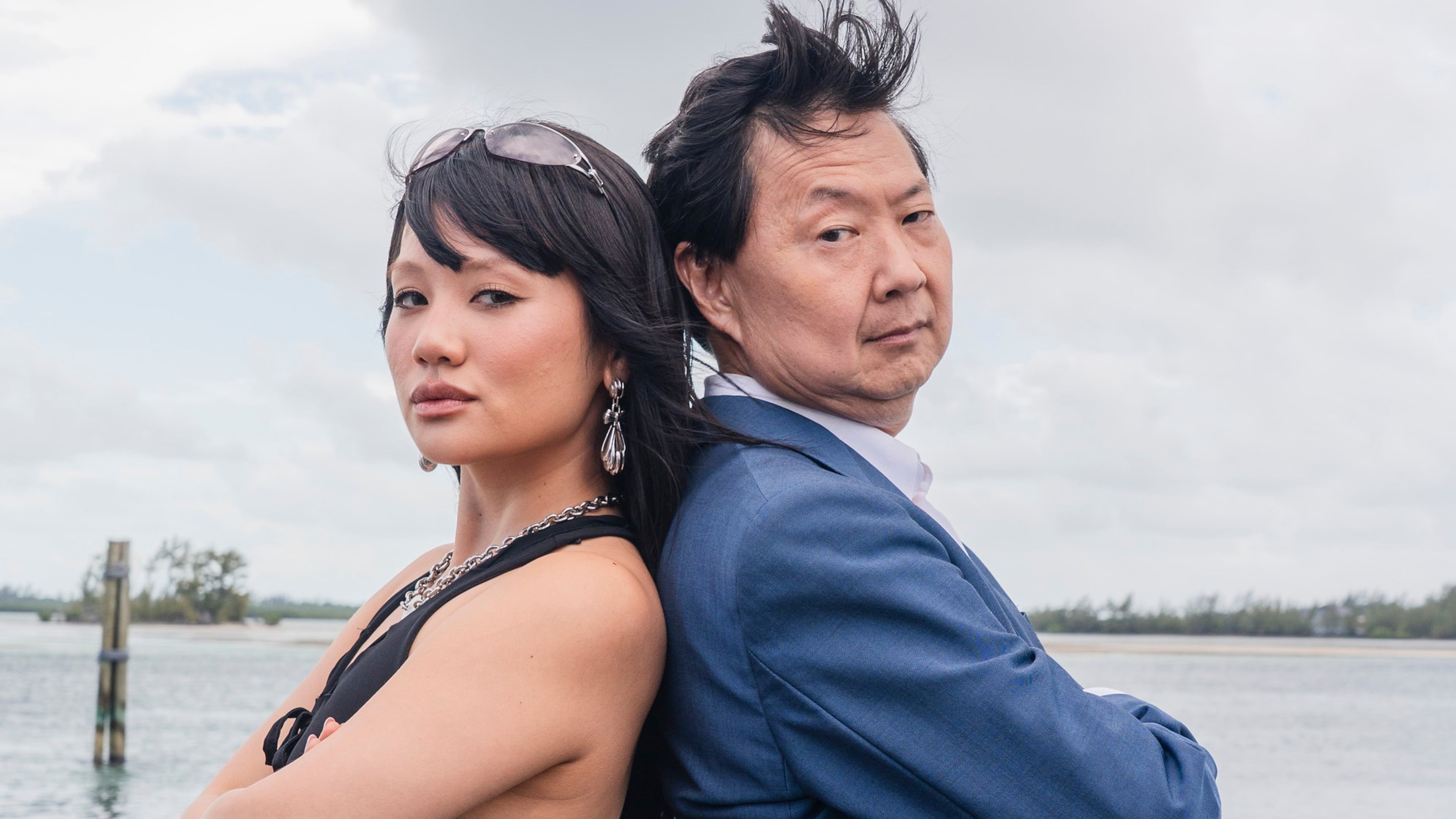 This image released by Discovery Channel shows KPop singer Rei Ami, left, and actor-comedian Ken Jeong who appear in “K-Pop Shark Heroes," kicking off Discovery's annual "Shark Week." (Tito Herrera/Discovery Channel via AP)