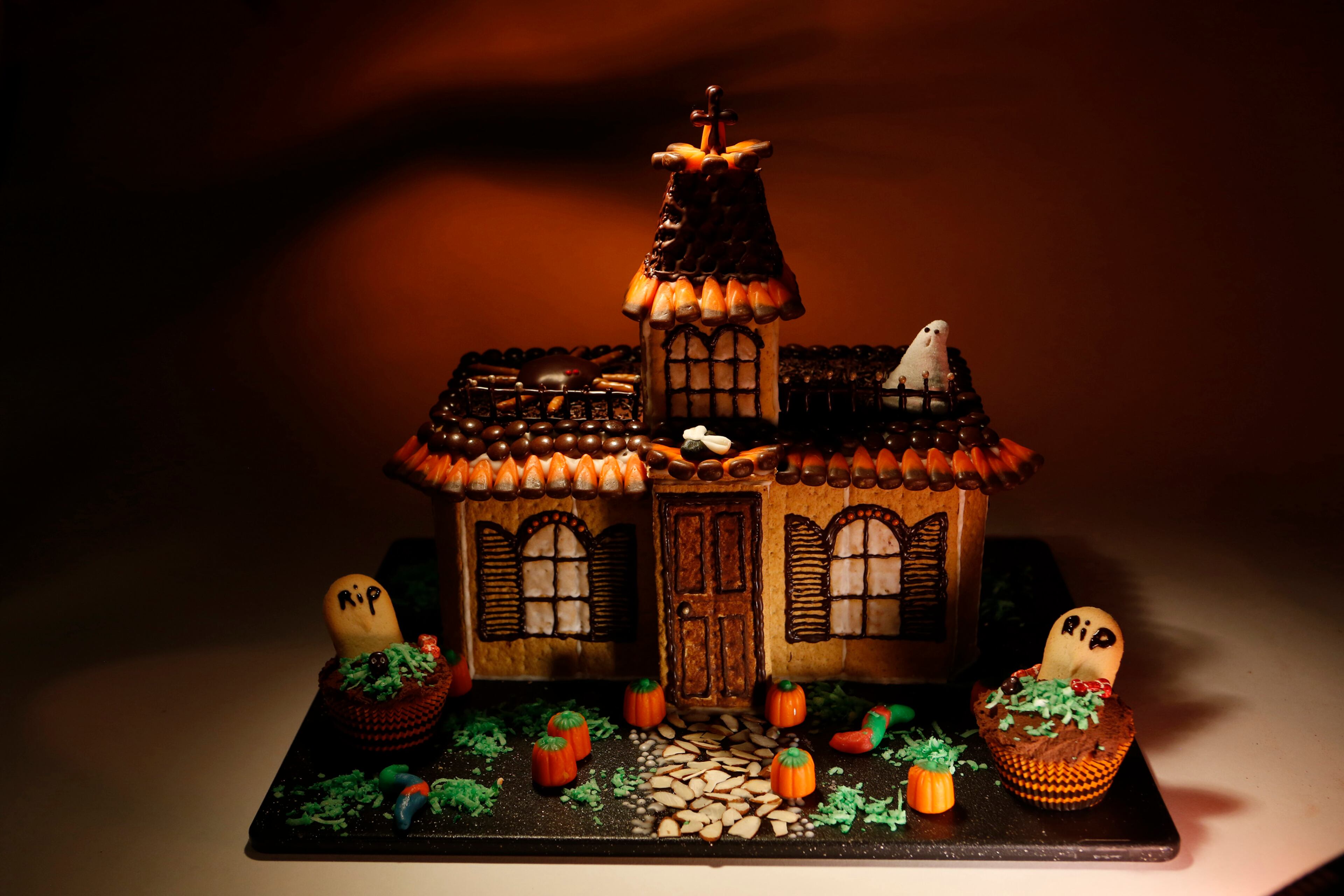 Instead of homemade gingerbread, simplify things using packaged graham crackers. Use a serrated knife to cut them into desired shapes and mold the house using royal icing. Give it plenty of time to dry before decorating; keep in mind that graham crackers are more fragile than gingerbread. (Anne Cusack/Los Angeles Times/MCT)