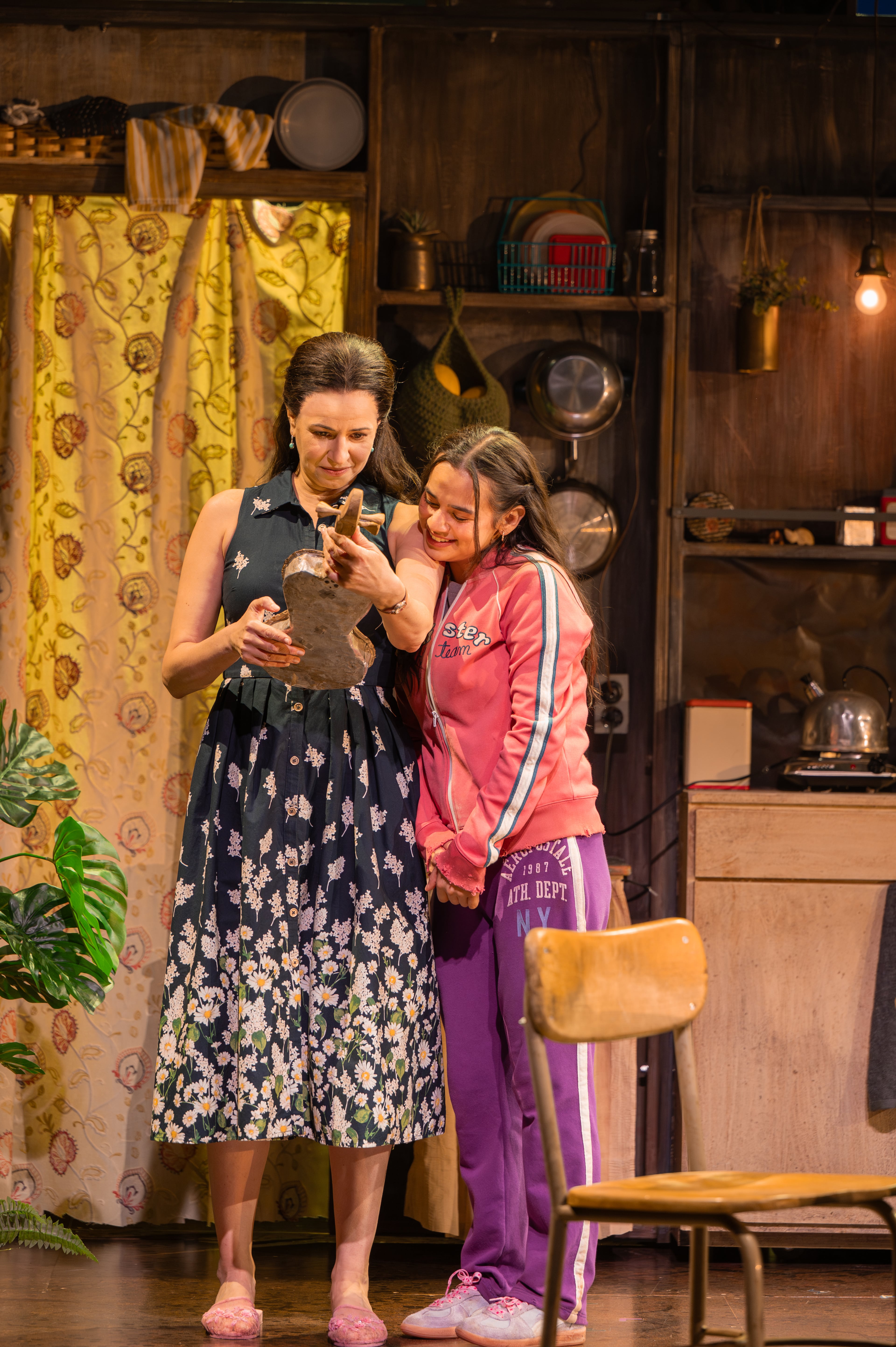 Mandy Gonzalez (left) as Mónica, the disillusioned mother of Nambi (Jaci Calderon). (Greg Mooney/Courtesy of Alliance Theatre)