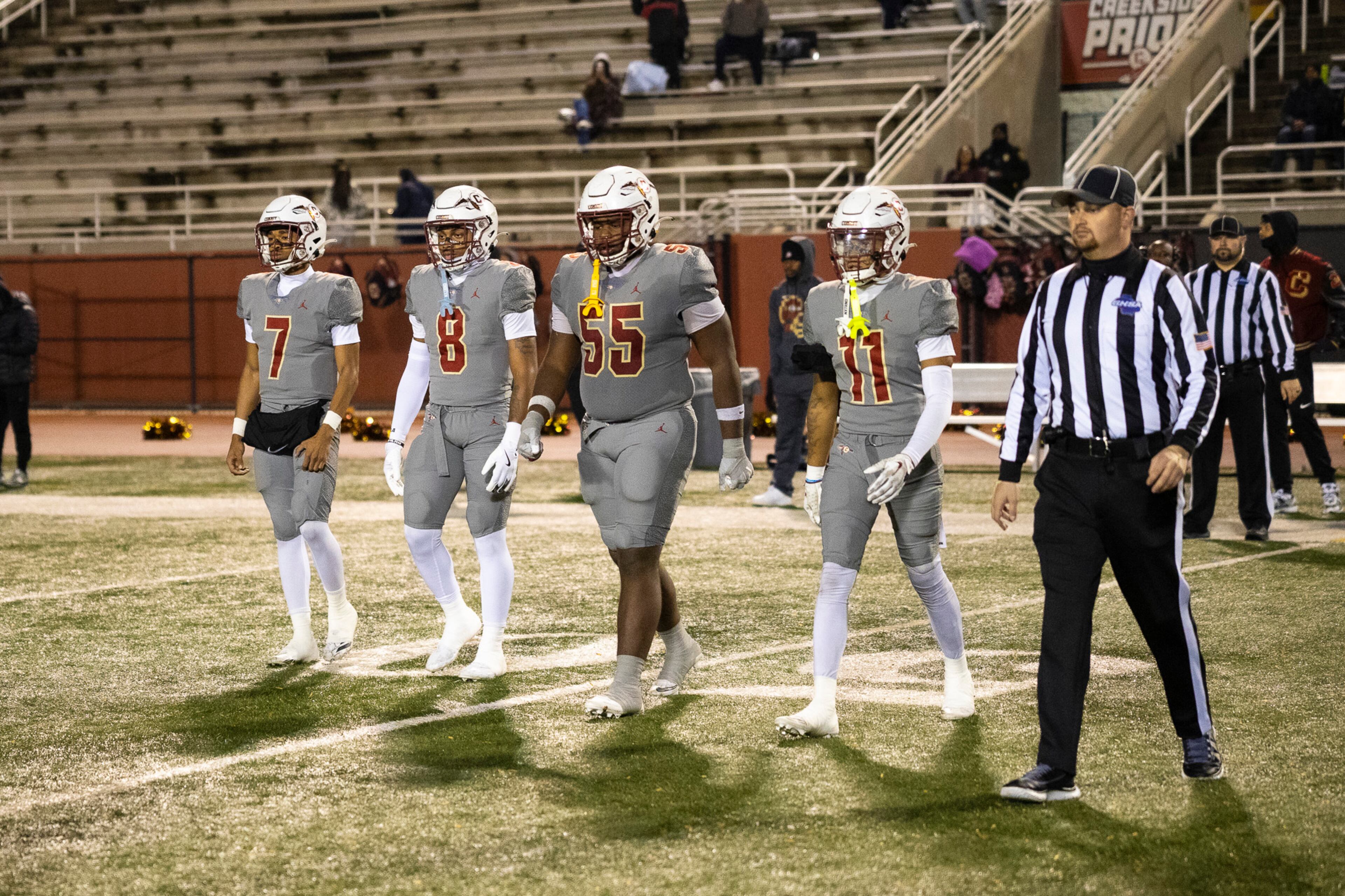 Creekside captains come up to the center circle before their Class 4A semifinal against Kell on Friday, Dec. 5, 2025, at Creekside High School in Fairburn. (Oscar Guevara Saenz for the AJC)