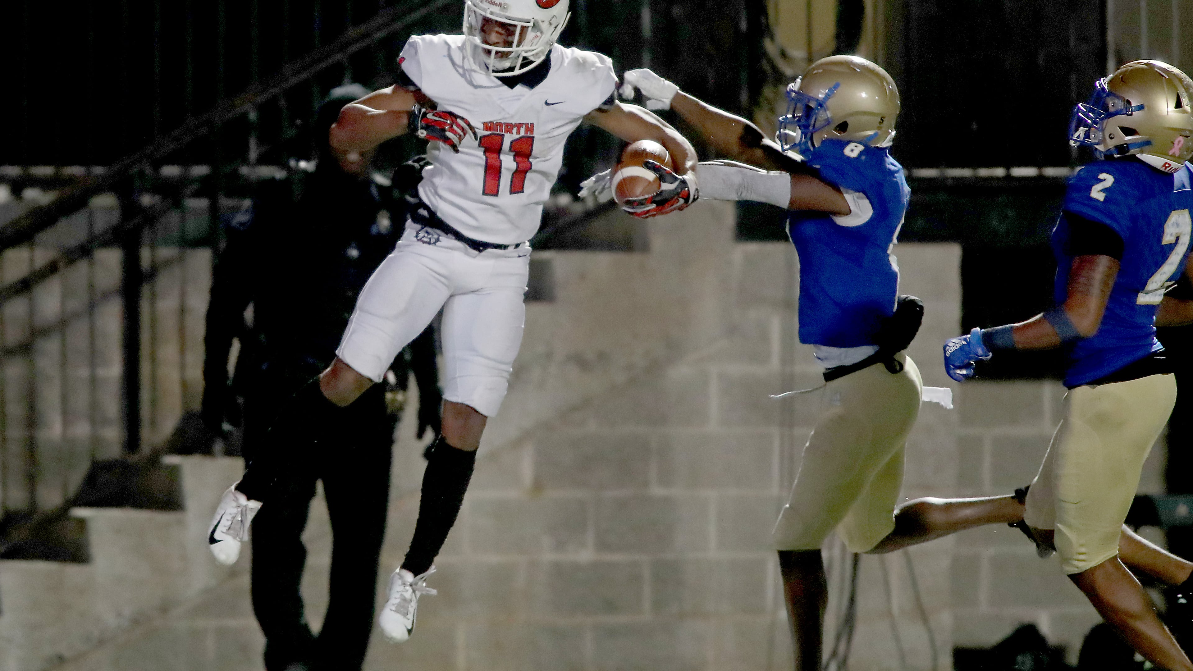 North Gwinnett wide receiver Josh Downs (11) scores a touchdown in the second half against McEachern during the Class 7A quarterfinals at McEachern High School Friday, November 29, 2019 in Powder Springs, Ga. North Gwinnett won 32-13. (JASON GETZ/SPECIAL TO THE AJC)