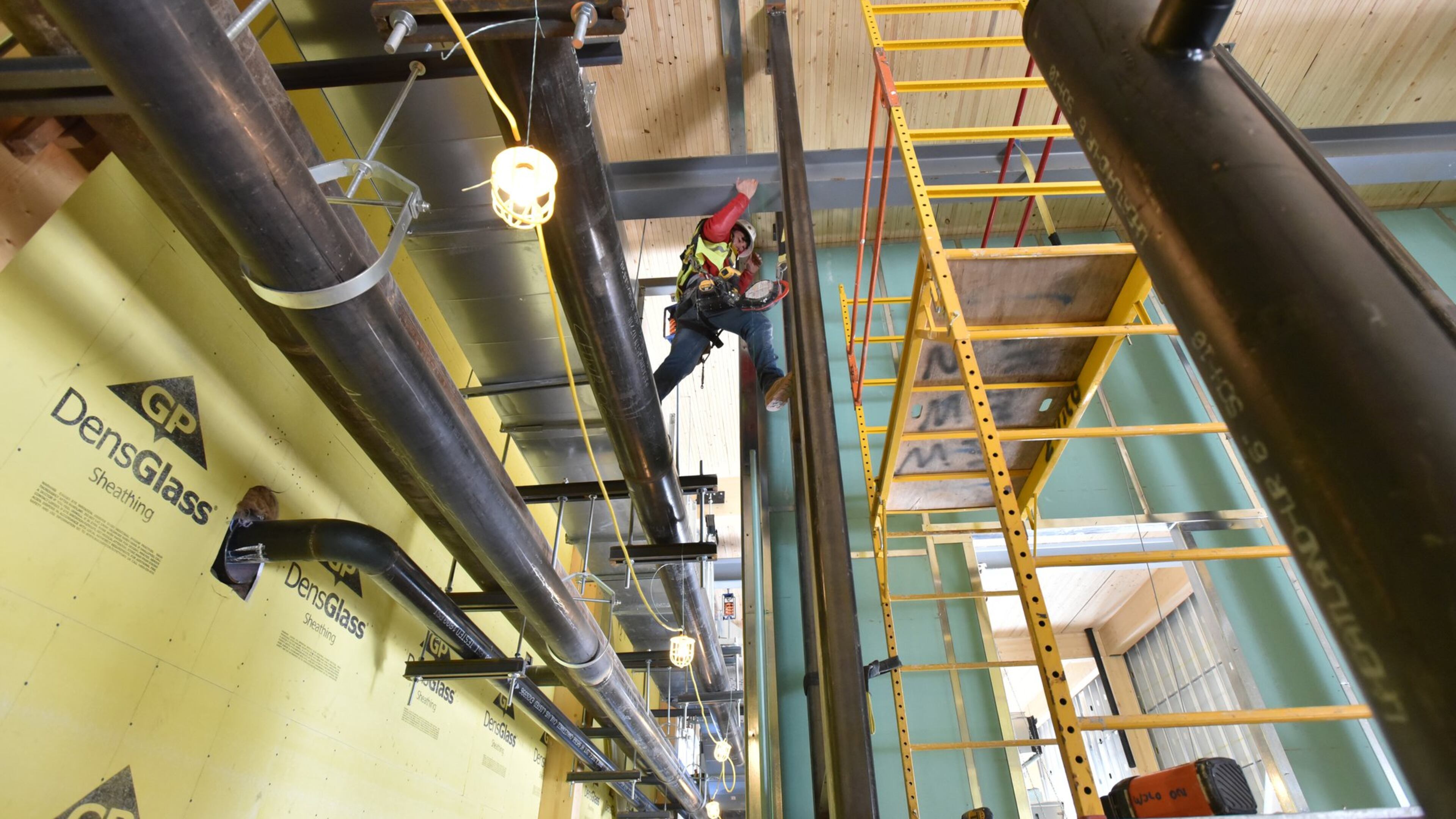 Construction crew working at Atlantic Station early in April. Construction jobs have grown faster than in any other sector. HYOSUB SHIN / HSHIN@AJC.COM