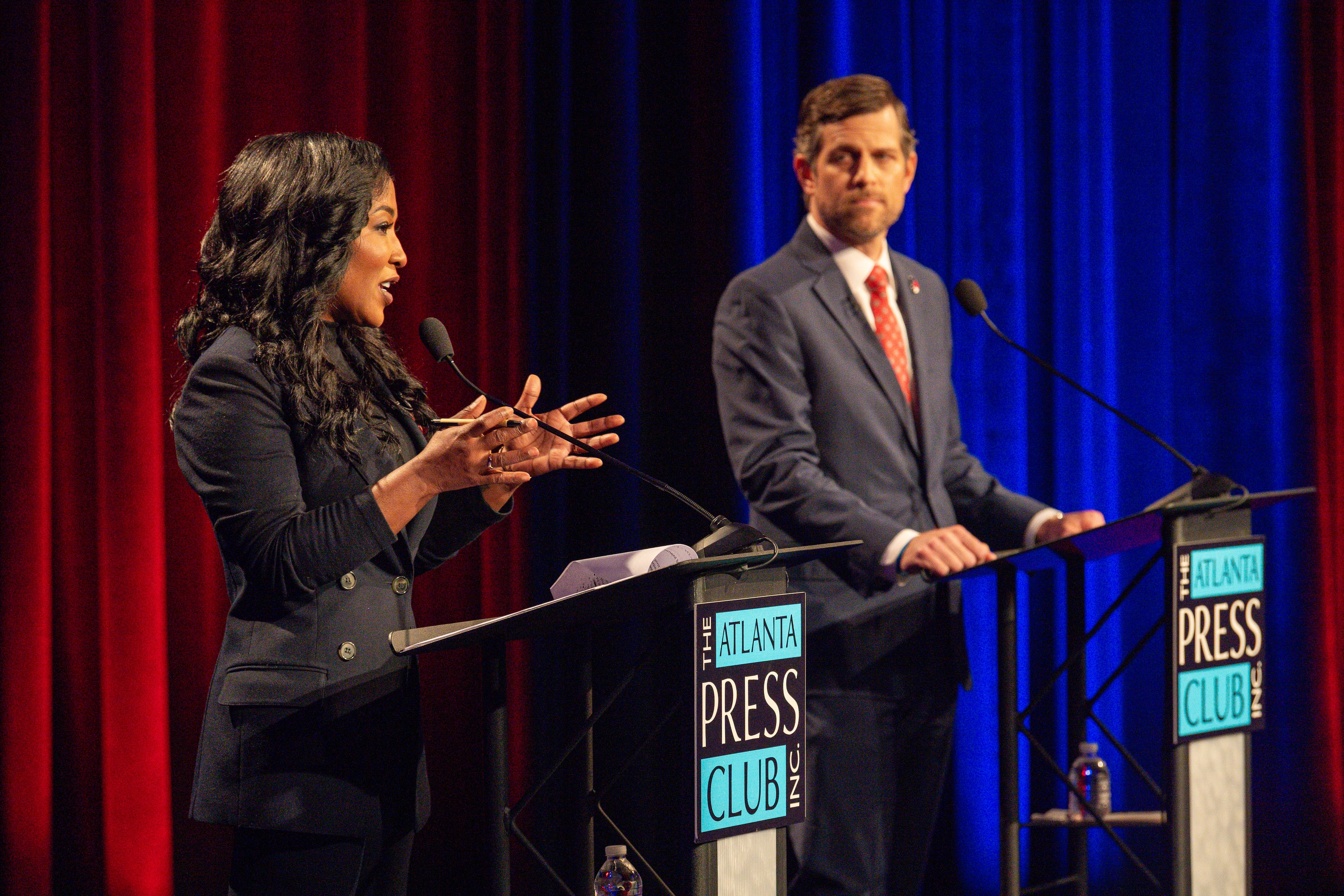 Democrat Tanya Miller (left) and Republican Brian Strickland participate in a debate for attorney general on Monday. (Pool photos by J Glenn Photography)
