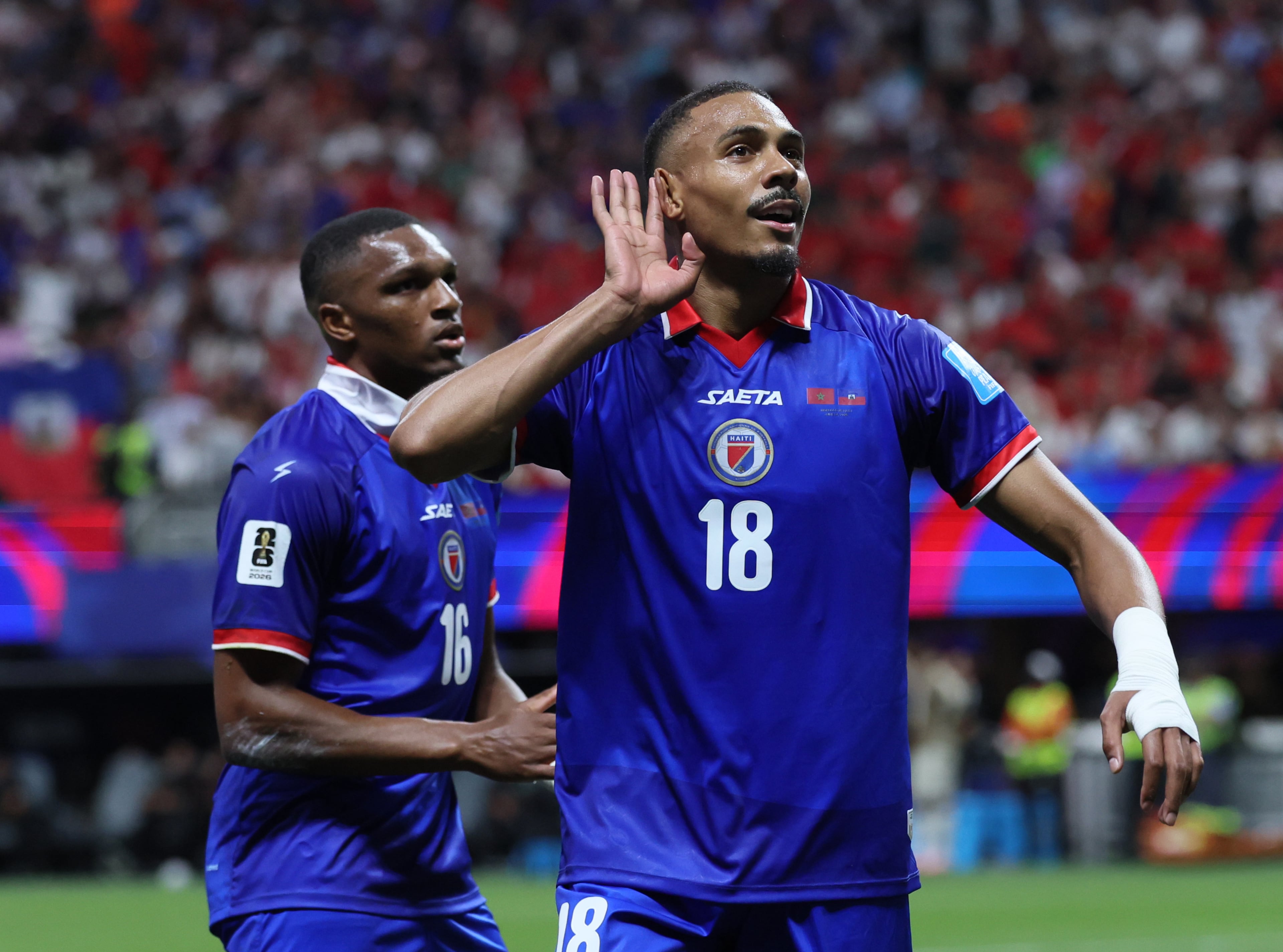 Haiti's Wilson Isidor, right, celebrates goal with teammate Lenny Joseph during first half of Morocco vs. Haiti Group C FIFA World Cup match at Atlanta Stadium (Mercedes-Benz Stadium) on Wednesday, June 24, 2026. (Jason Getz/AJC)