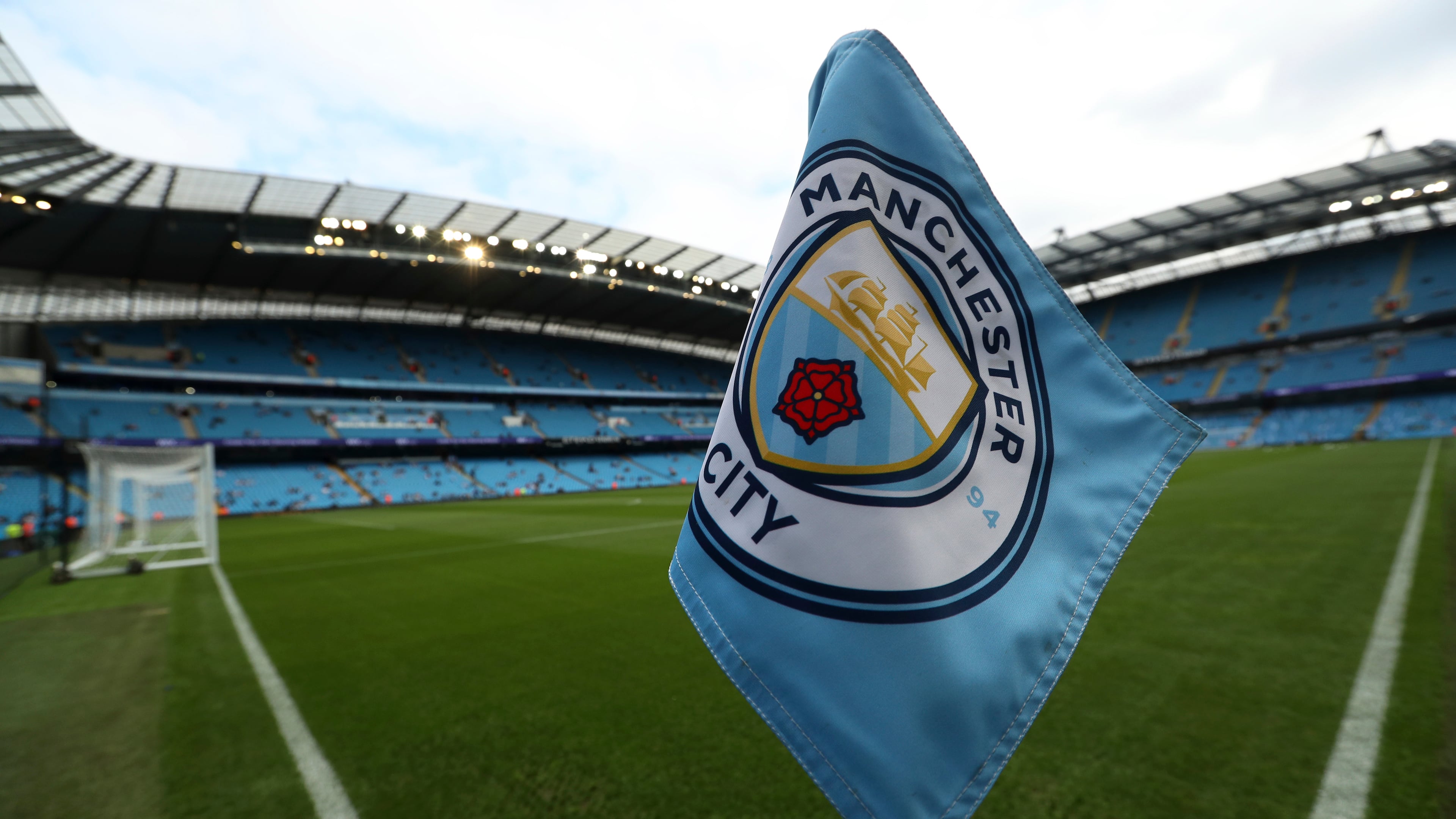 FILE - The club logo decorates a corner flag before the English Premier League soccer match between Manchester City and Newcastle United at the Etihad Stadium in Manchester, England, Saturday, Sept. 1, 2018. (AP Photo/Jon Super, File)