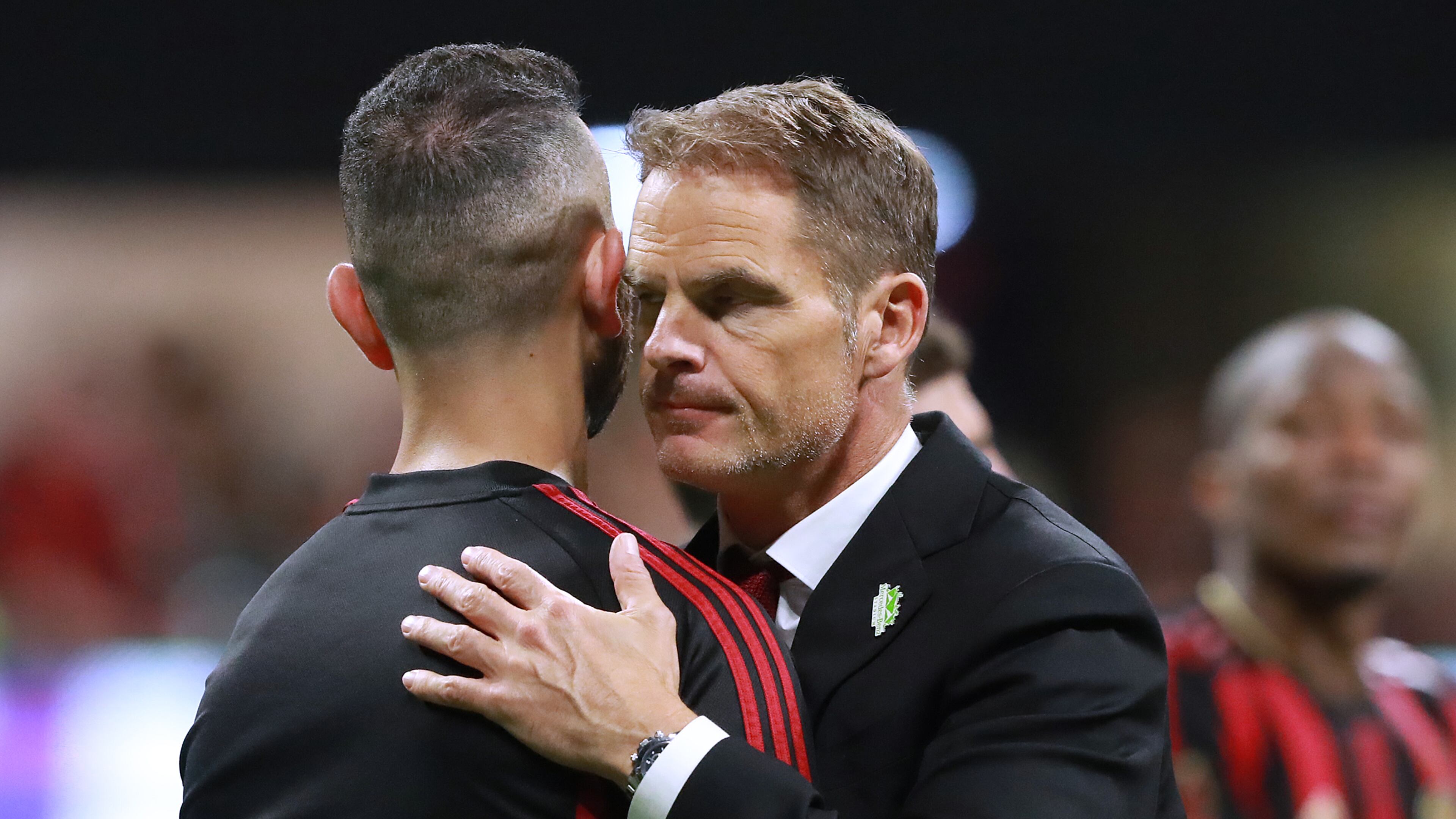 Atlanta United head coach Frank de Boer hugs midfielder Justin Meram after falling 2-1 to Toronto FC in the Eastern Conference Final on Wednesday, October 30, 2019, in Atlanta. Curtis Compton/ccompton@ajc.com