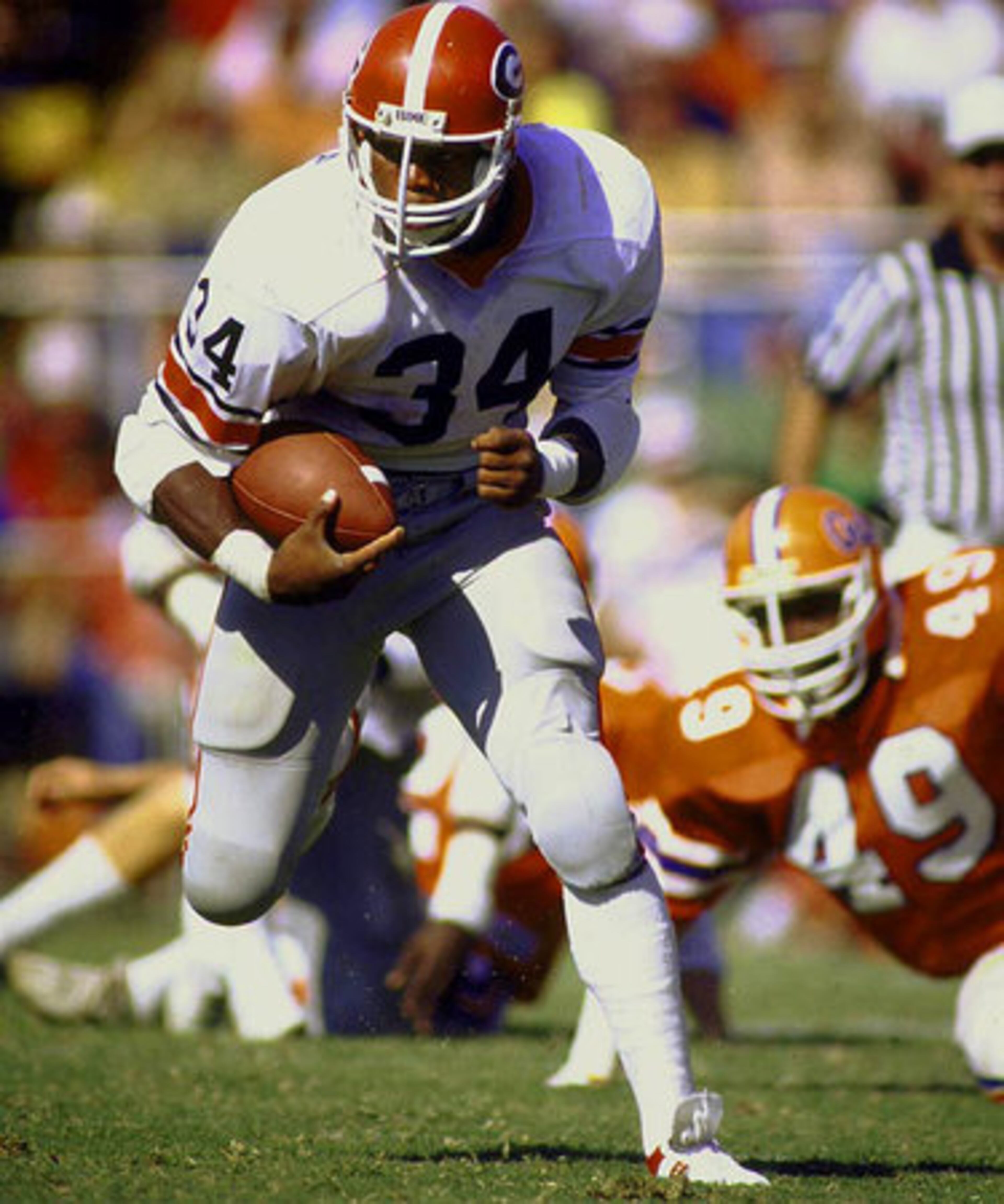 1981, GEORGIA 26-FLORIDA 21: Georgia running back Herschel Walker dashed over Florida defenders setting a record for total yards (279), which included 192 on the ground, 55 receiving and 32 return yards in 53 plays.