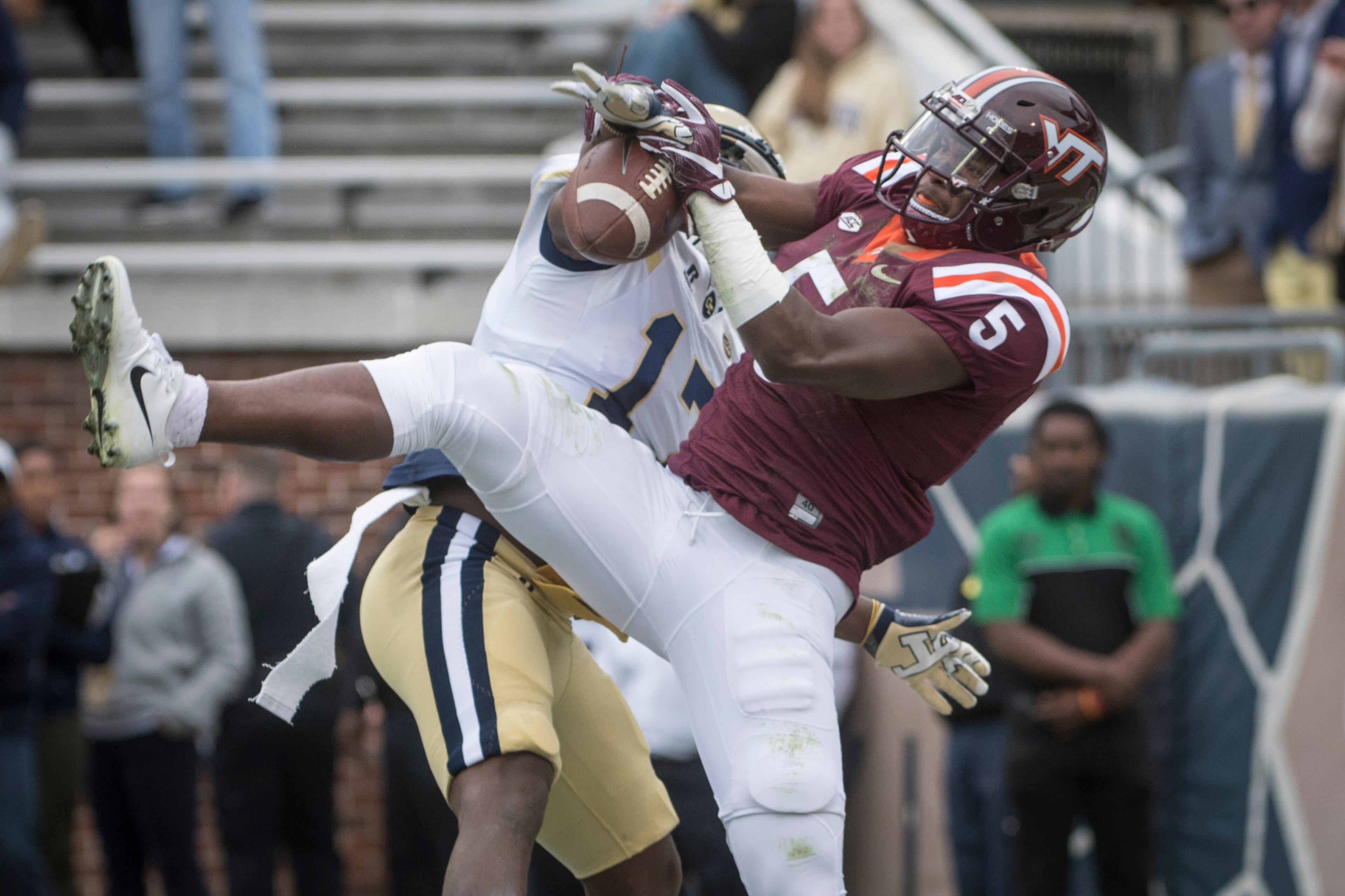 Georgia Tech defensive back Lance Austin (17) breaks up a pass in the end zone to Virginia Tech wide receiver Cam Phillips (5) during the first half of a football game on Saturday, Nov.11, 2017, in Atlanta. (Photo/John Amis)