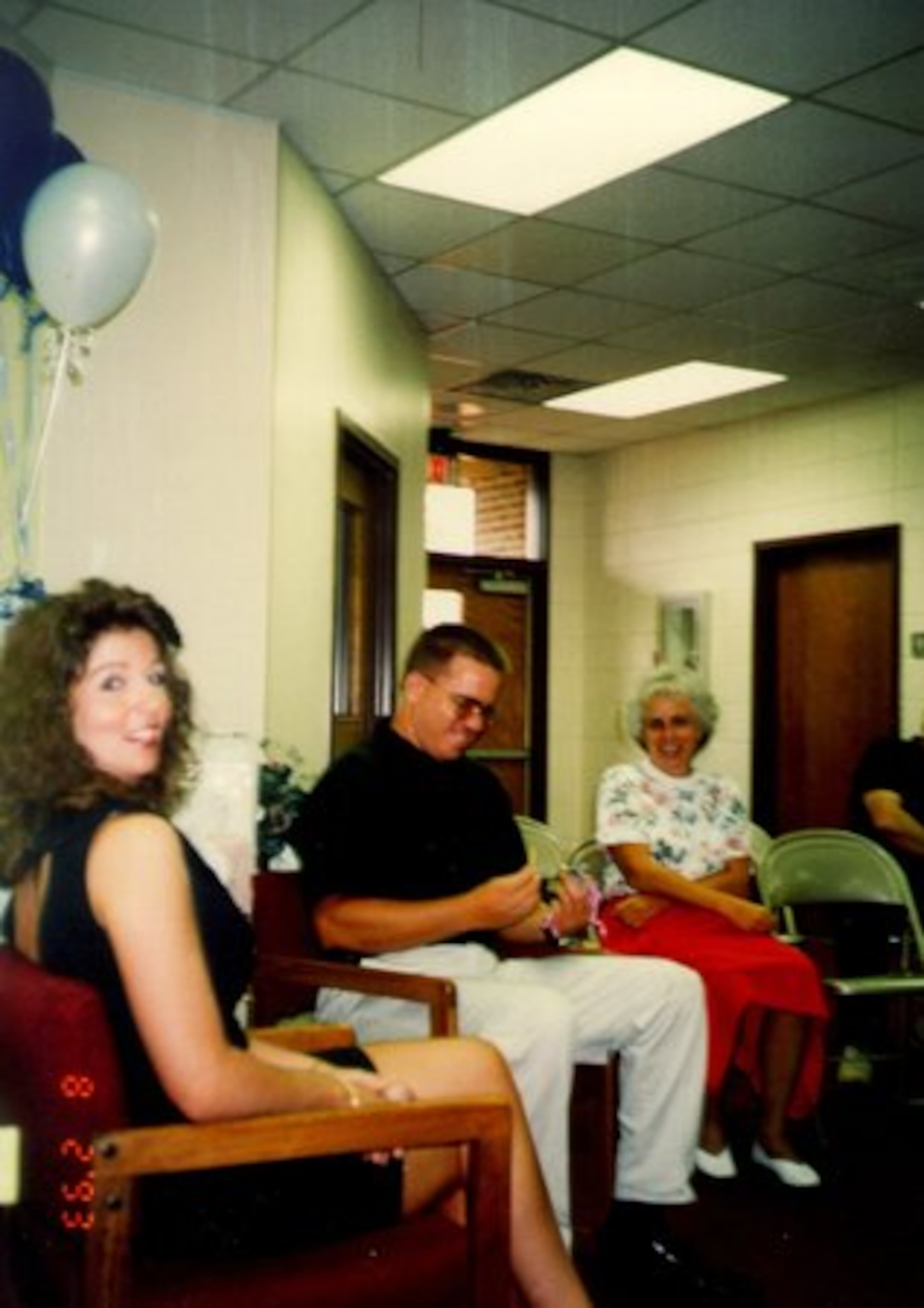 Lynn Turner, Glenn Turner and Glenn's mother, Kathy Turner attend Glenn and Lynn's wedding shower.
