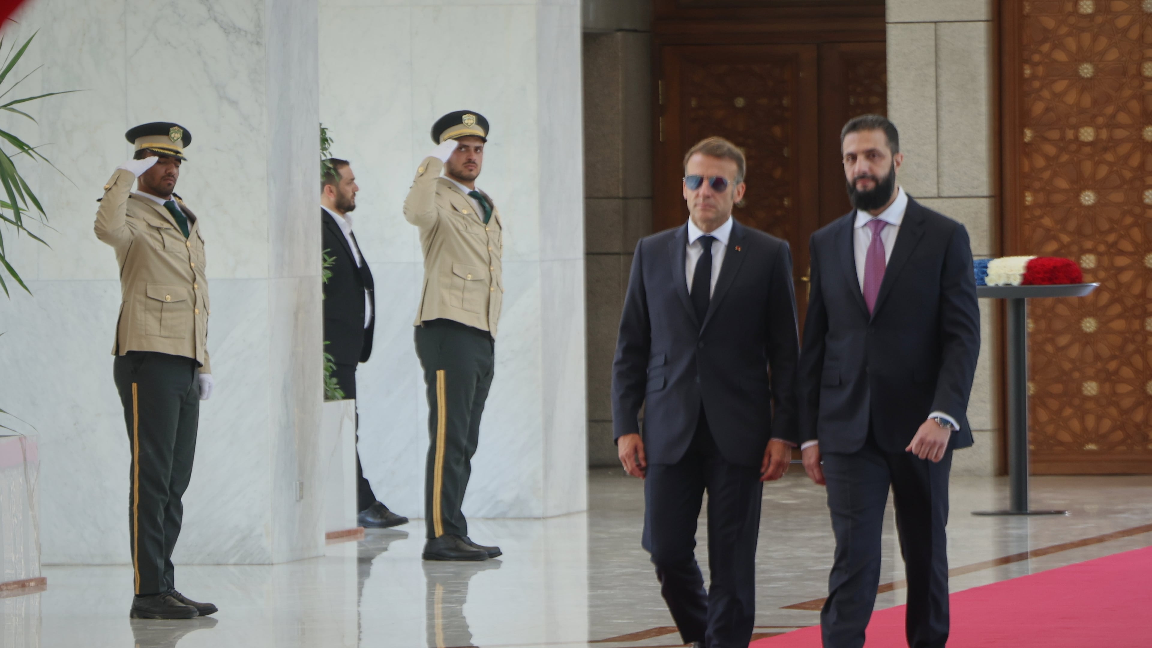 Syrian President Ahmad al-Sharaa, right, meets French President Emmanuel Macron at the presidential palace in Damascus, Syria, Tuesday, July 7, 2026. (AP Photo/Ghaith Alsayed)