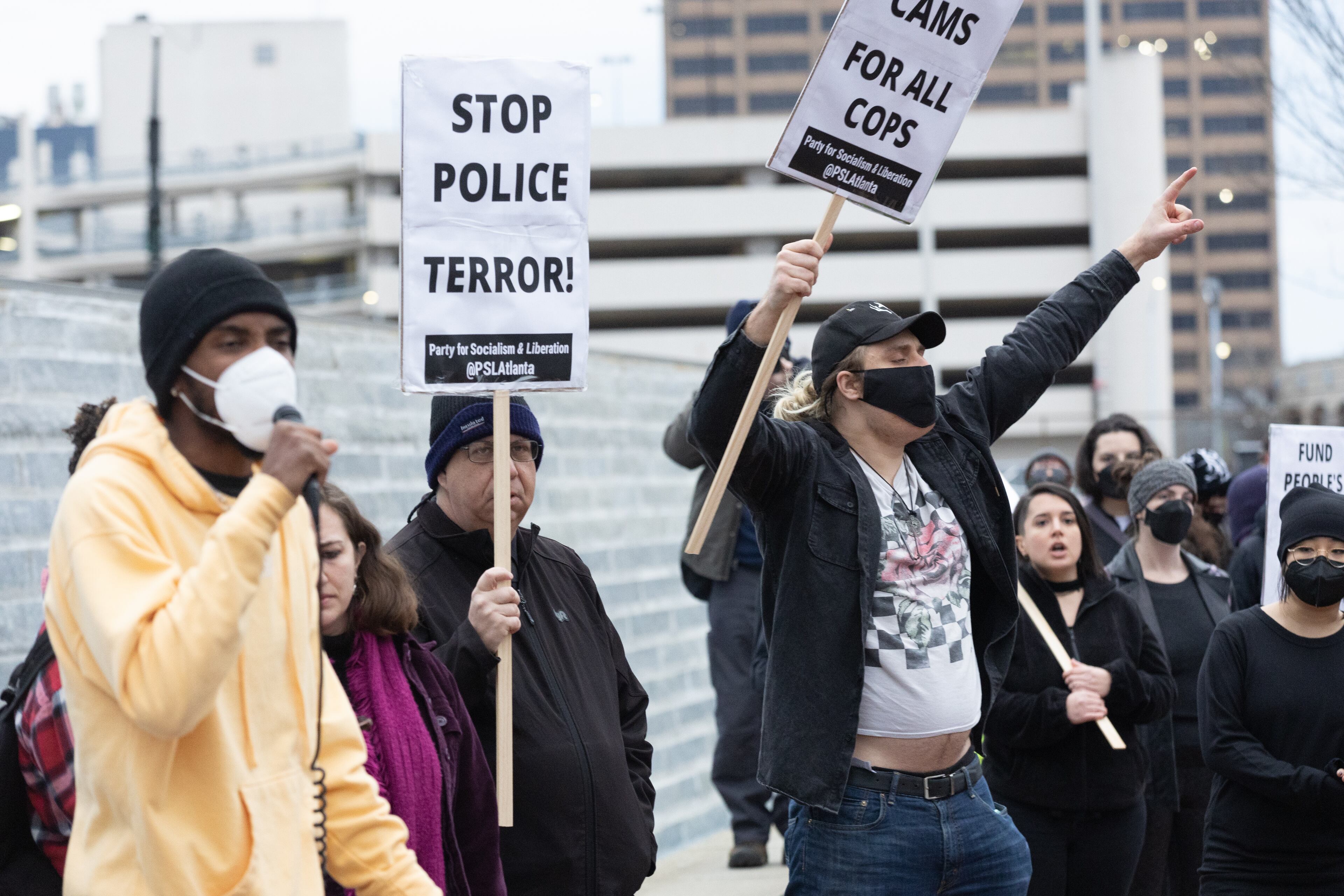 Forest Defender protesters gathered for a rally near Underground Atlanta Saturday, Jan. 21, 2023. Atlanta Police Department said several people were arrested after a Police car was set afire. (Steve Schaefer/steve.schaefer@ajc.com)