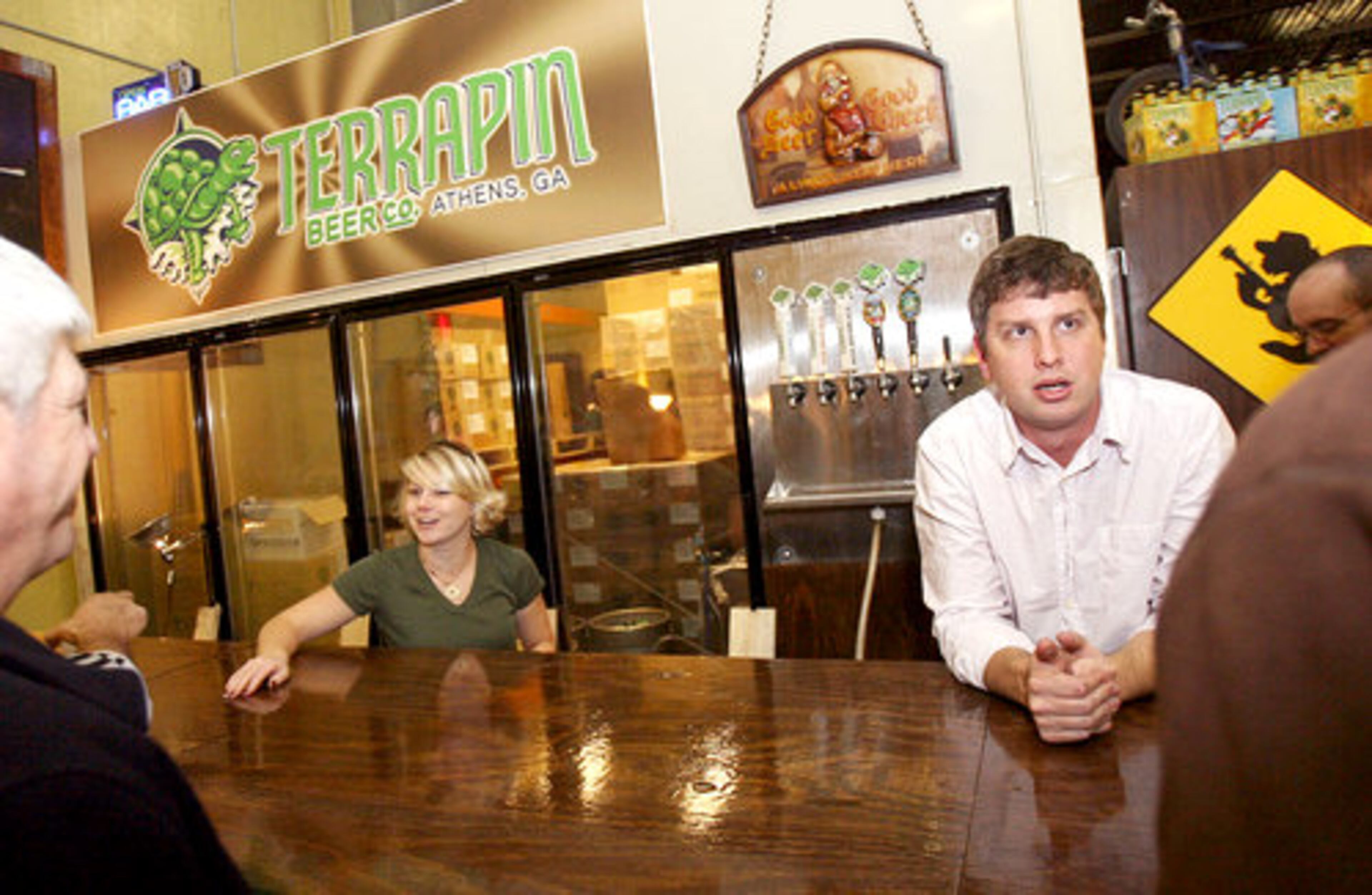 Terri Matthews (left) and Steve Hayes tend bar at the new brewery.