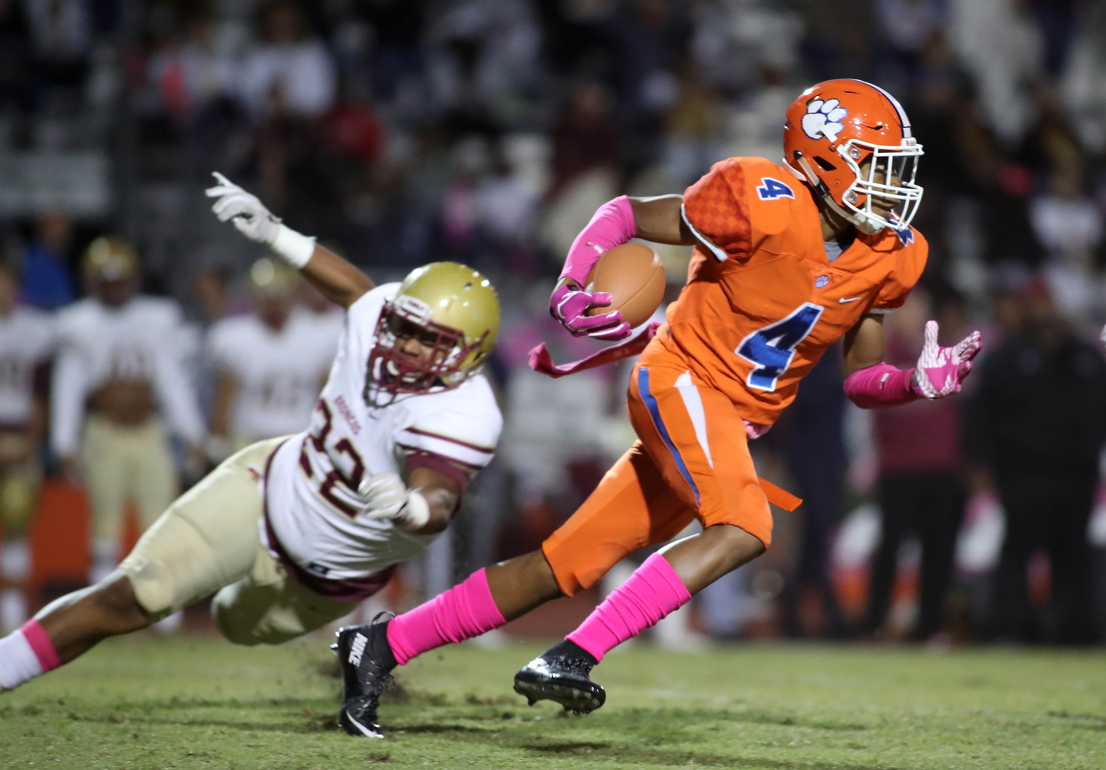 October 20, 2017 - Lilburn, Ga: Parkview wide receiver CJ Daniels (4) eludes the tackle of Brookwood linebacker Ennio Zambino (22) in the first half of their game at Parkview High School Friday, October 20, 2017, in Lilburn, Ga.. PHOTO / JASON GETZ