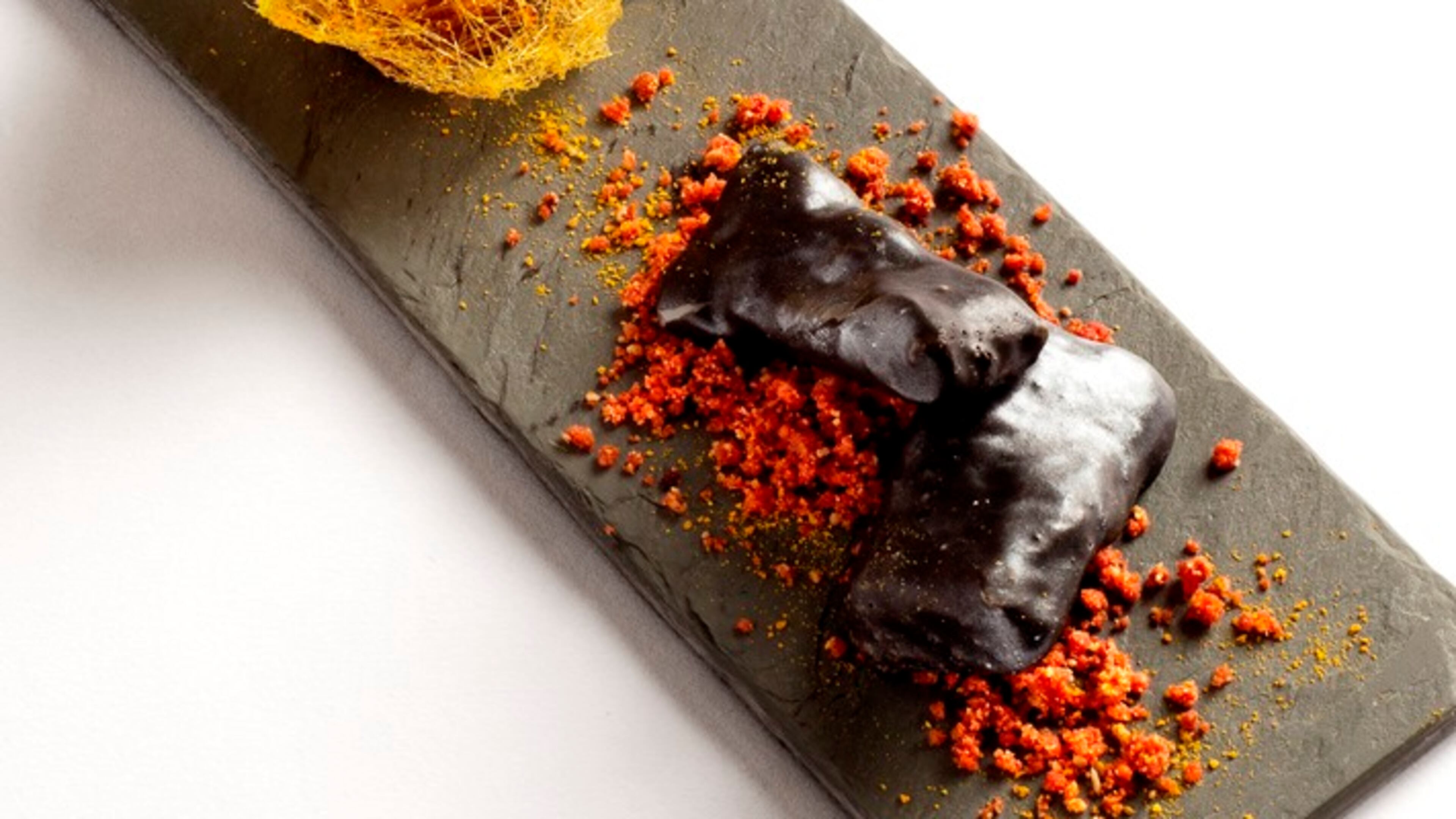 In an undated handout photo, the Spanish- style Ametsa Afternoon Tea with chocolate churros at the Halkin. The spread was created by the Michelin-starred chef Sergio Sanz Blanco and is part of a growing trend of properties that are doing away with the predictability of afternoon tea by offering creative interpretations of the classic pastime.