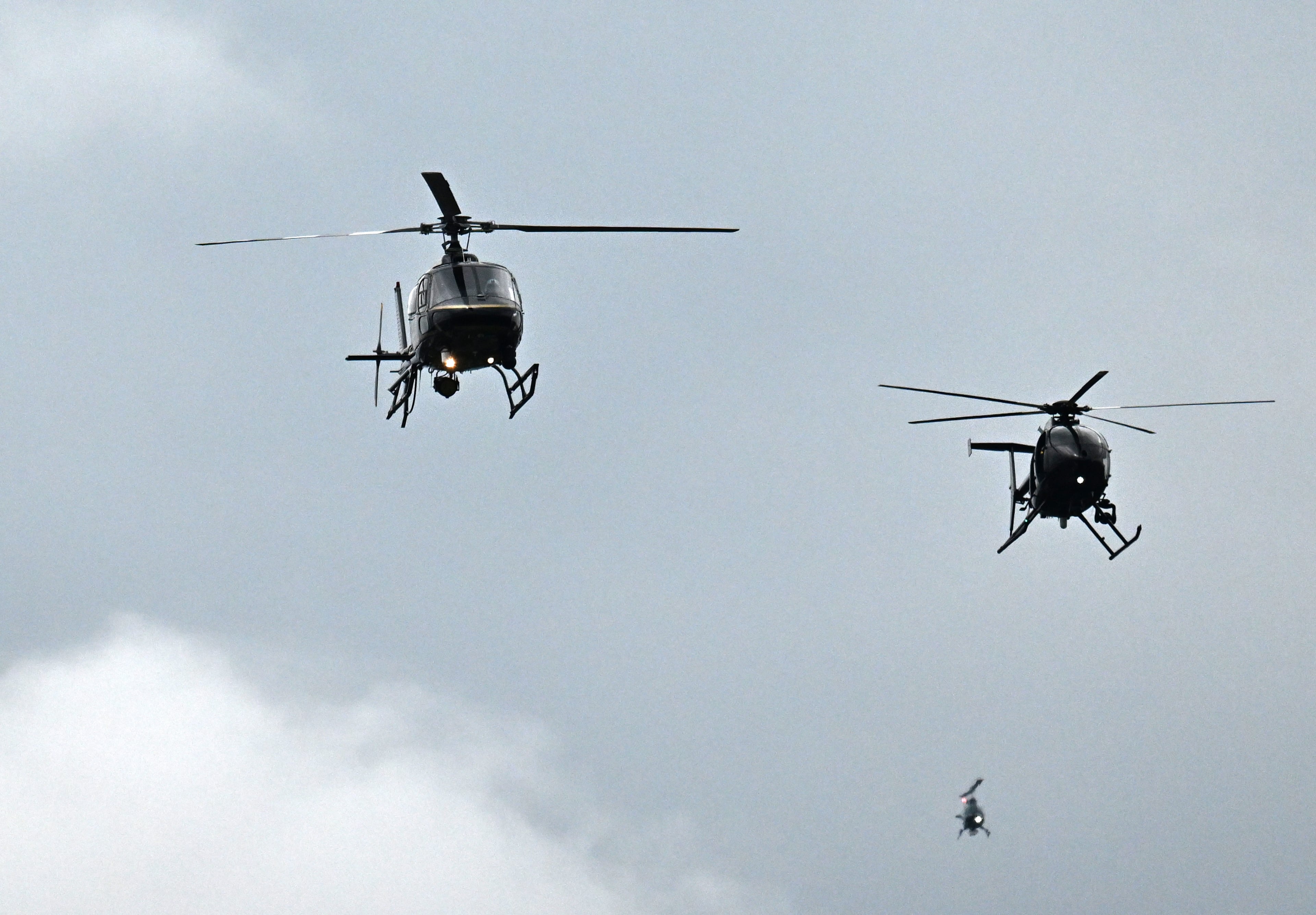 A flyover takes place following the memorial service for DeKalb County police Officer David Rose, who was killed while responding to the Aug. 8 shooting at the CDC, outside the First Baptist Church Atlanta, Friday, August 22, 2025, in Atlanta. Hyosub Shin / AJC)