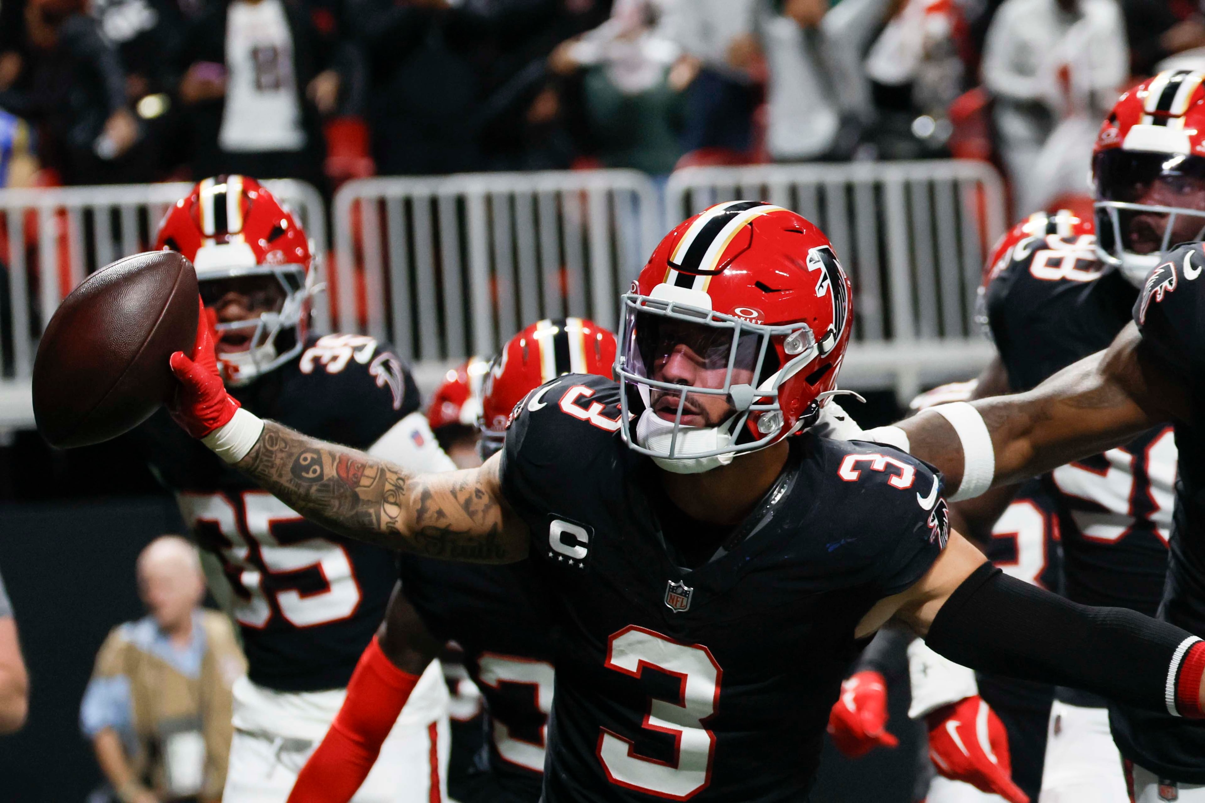Atlanta Falcons running back Bijan Robinson (7) reacts after scoring a touchdown during the first half of an NFL football game against the Los Angeles Rams at Mercedes-Benz Stadium in Atlanta on Monday, Dec. 29, 2025. (Miguel Martinez/ AJC)