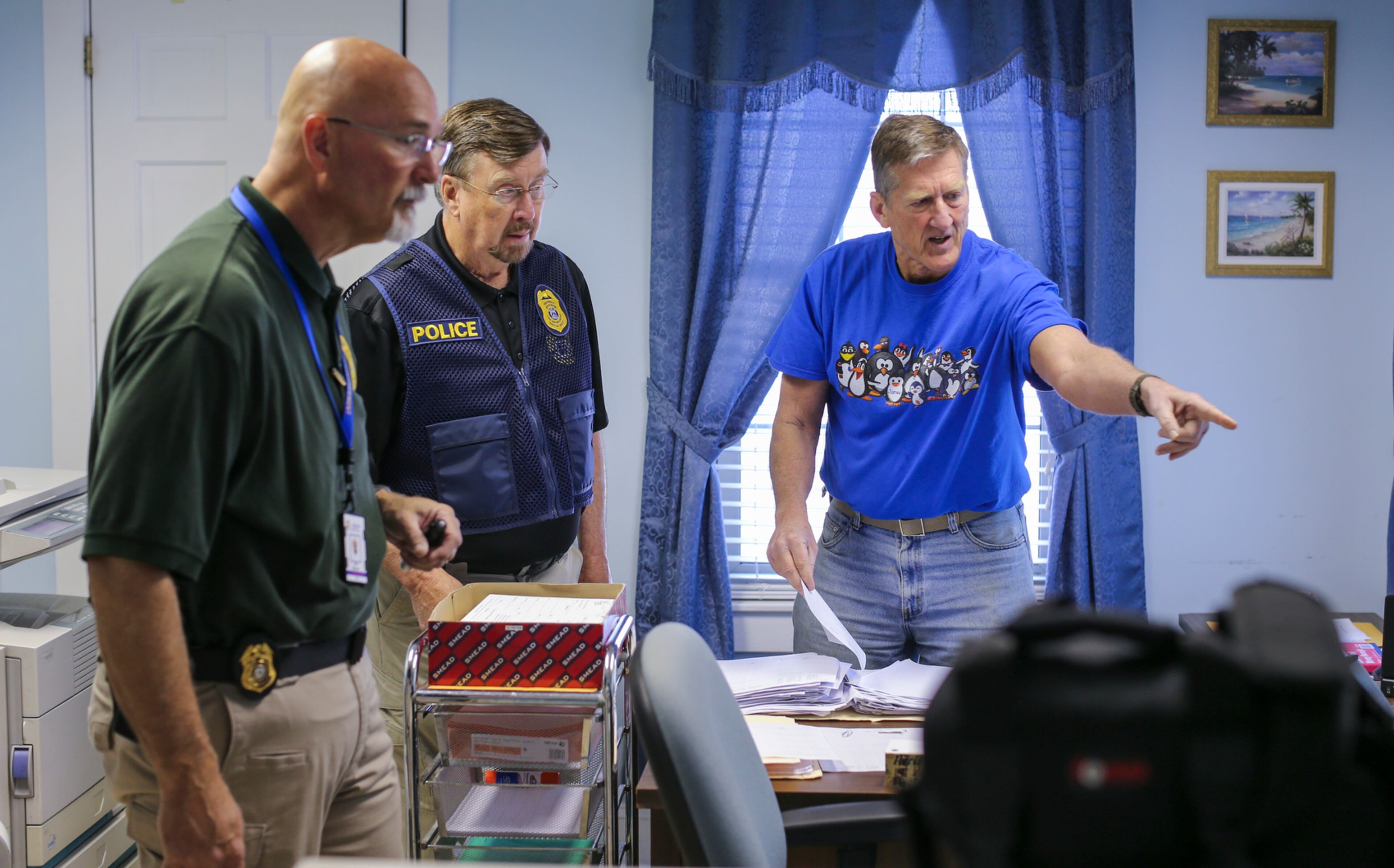Georgia Department of Revenue agents removed evidence from B&B Accounting and Tax Services offices on May 6, 2016. The agency is investigating the company and its owner, Ruth Barr, for suspected tax fraud. JOHN SPINK / JSPINK@AJC.COM