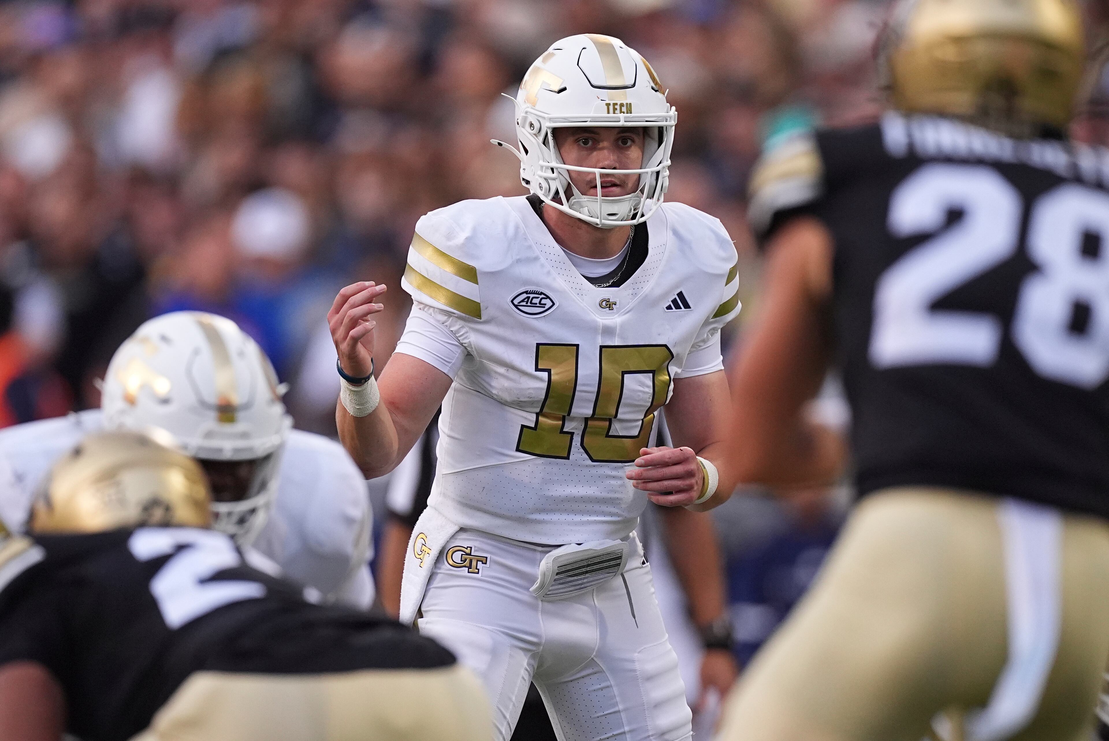 Georgia Tech quarterback Haynes King (center) calls a play at the line of scrimmage during the first half against Colorado on Friday, Aug. 29, 2025, in Boulder, Colo. (David Zalubowski/AP)