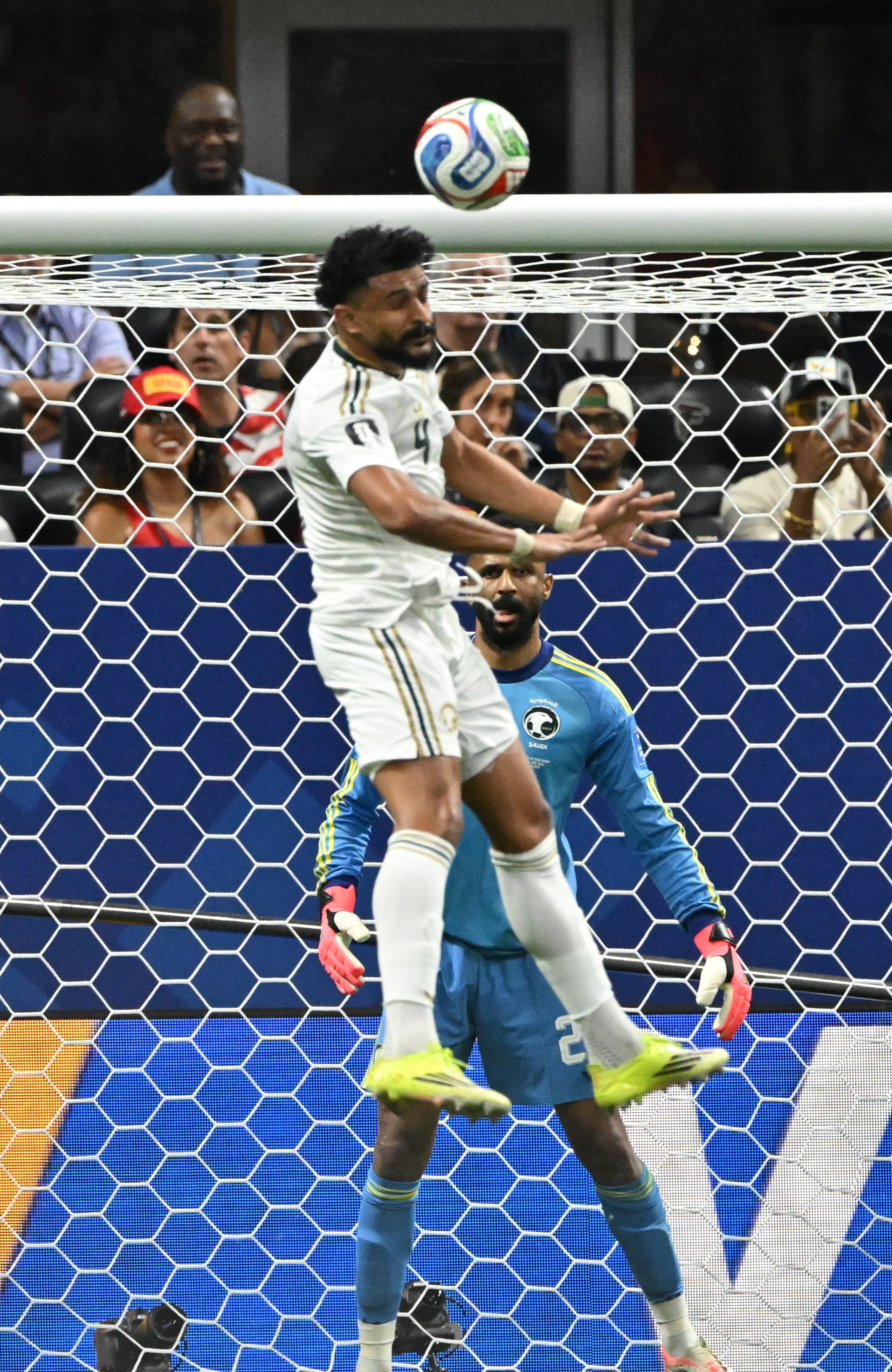 Saudi Arabia's Abdulelah Al-Amri heads the ball away from the goal during the first half of the Spain vs. Saudi Arabia World Cup match Sunday, June 21, 2026, at Atlanta Stadium. (Hyosub Shin/AJC)