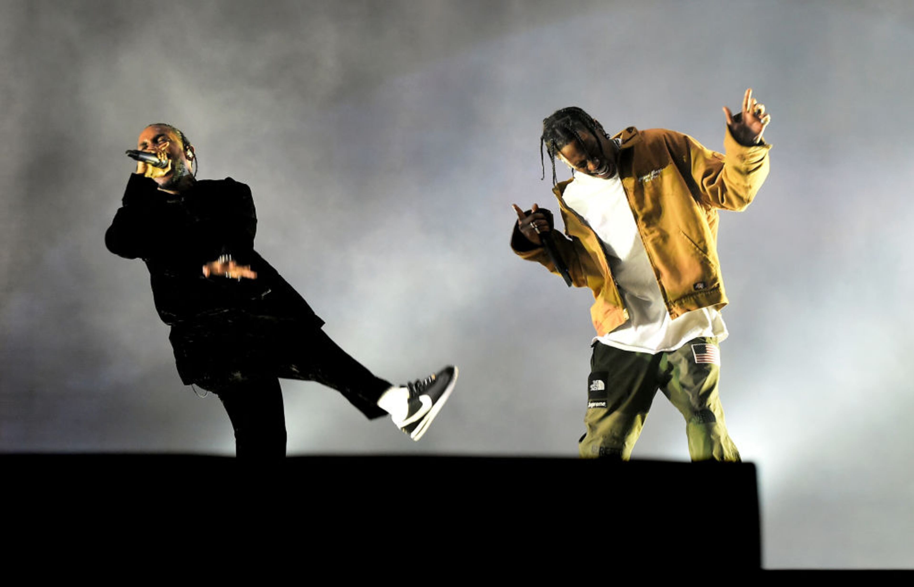 INDIO, CA - APRIL 16: Rappers Kendrick Lamar (L) and Travis Scott perform on the Coachella Stage during day 3 of the Coachella Valley Music And Arts Festival (Weekend 1) at the Empire Polo Club on April 16, 2017 in Indio, California. (Photo by Kevin Winter/Getty Images for Coachella)