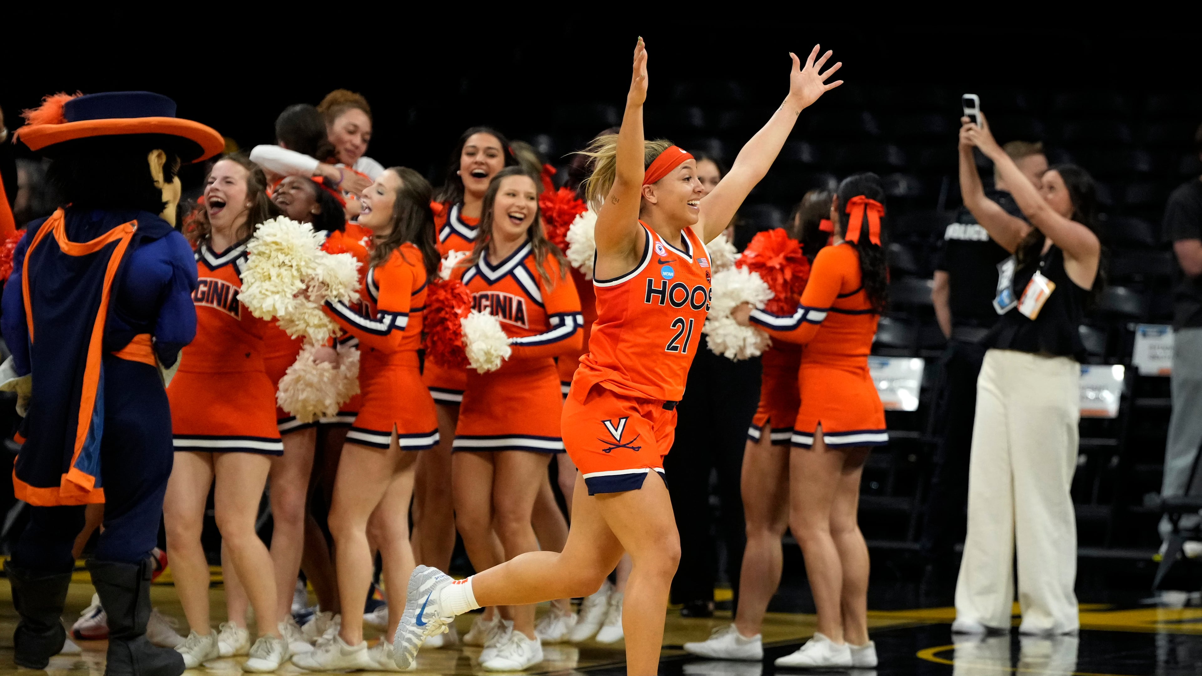 FILE - Virginia guard Kymora Johnson (21) celebrates after a second round game against Iowa in the NCAA college basketball tournament, March 23, 2026, in Iowa City, Iowa. (AP Photo/Charlie Neibergall, File)
