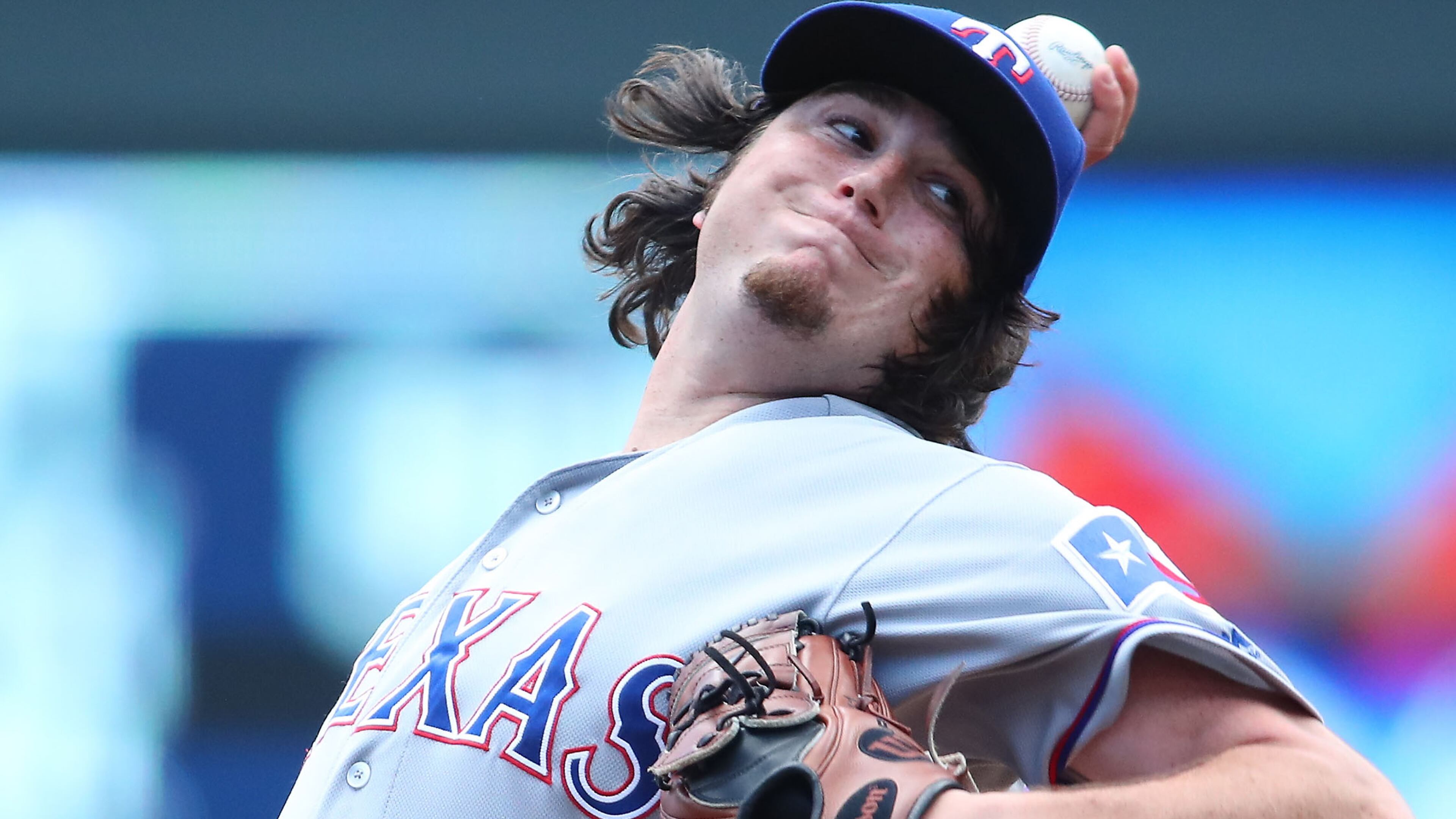 MINNEAPOLIS, MN - JULY 02: Luke Jackson #77 of the Texas Rangers pitches in the fifth inning against the Minnesota Twins at Target Field on July 2, 2016 in Minneapolis, Minnesota. The Minnesota Twins defeated the Texas Rangers 17-5. (Photo by Adam Bettcher/Getty Images)