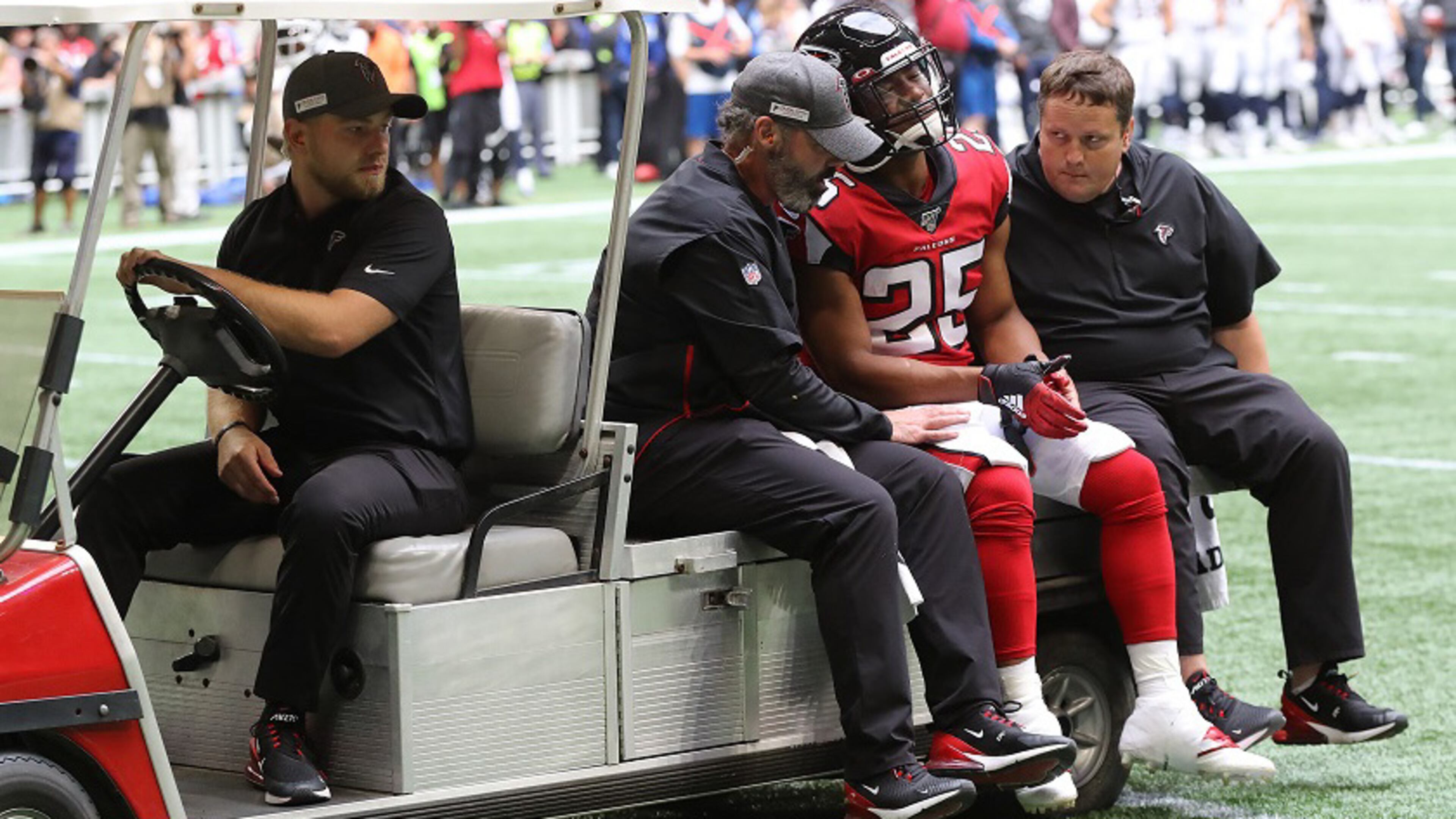 Falcons running back Ito Smith leaves the game injured during the first half against the Los Angeles Rams on Sunday, October 20, 2019, in Atlanta. Curtis Compton/ccompton@ajc.com