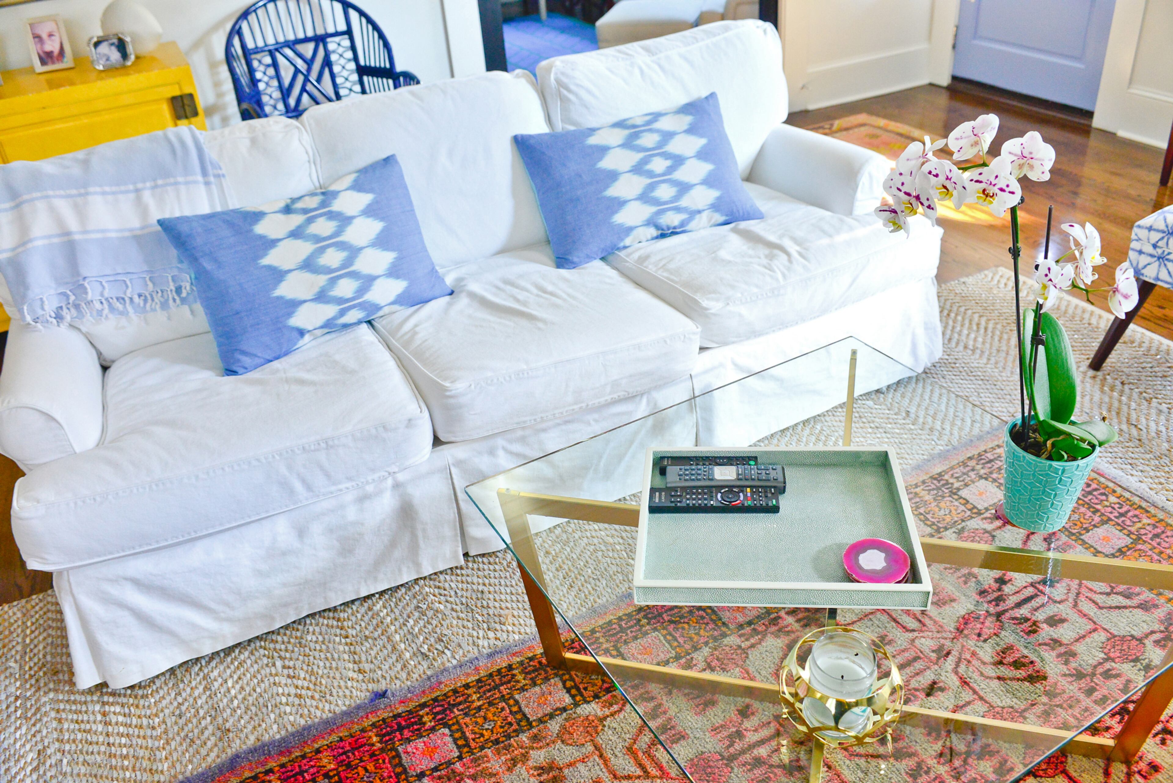 The sofa, by Lee, is from GDC Home in South Carolina. It provides a clean backdrop for all of the color and pattern in the space.