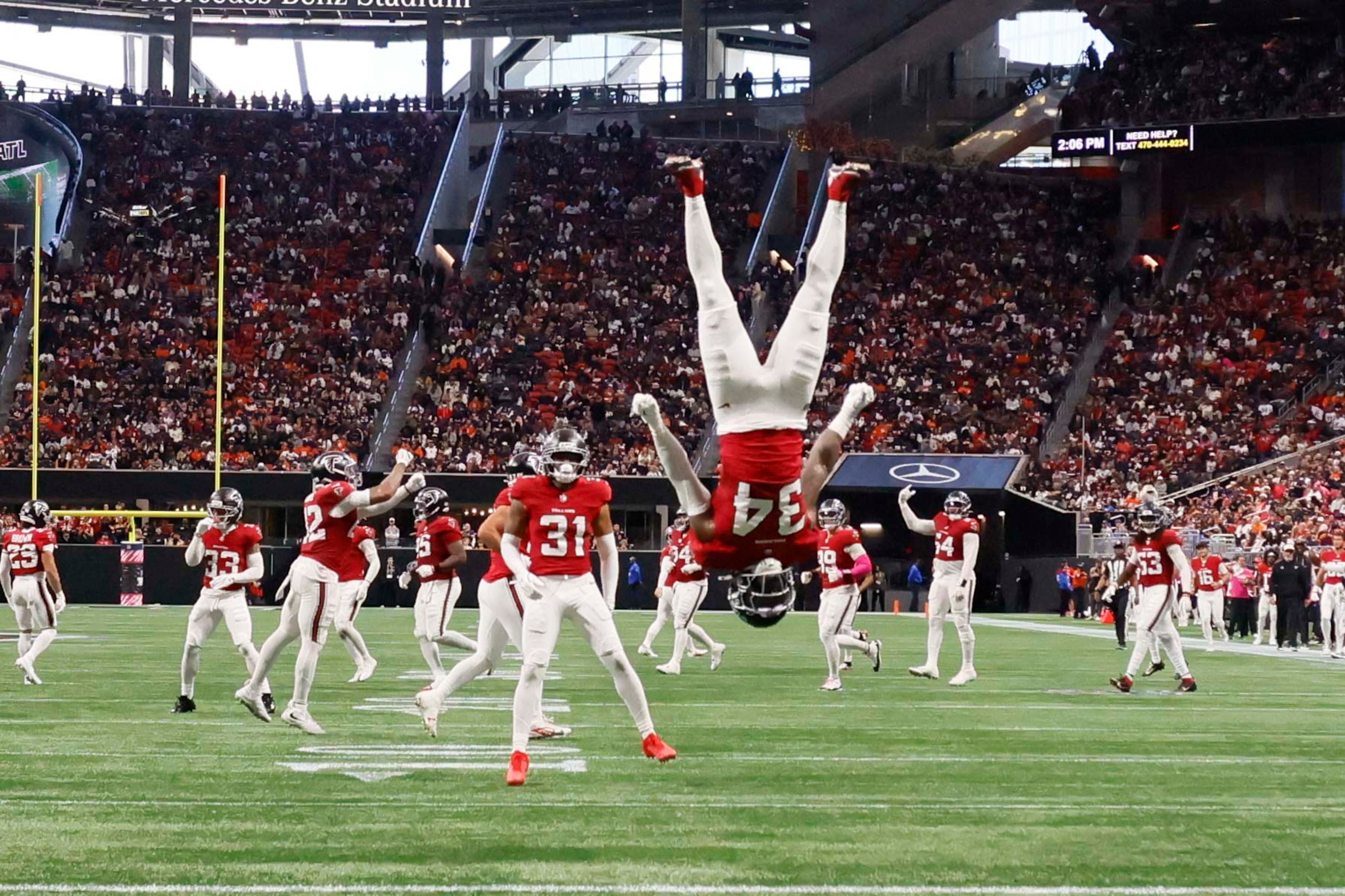 Atlanta Falcons safety Jammie Robinson performs a flip after a play in the first half of an NFL game against the Chicago Bears at Mercedes-Benz Stadium in Atlanta on Sunday, Oct. 18, 2026. (Miguel Martinez/AJC)
